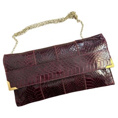 1950s High Quality Burgundy Leather and Brass Italian Shoulder Bag