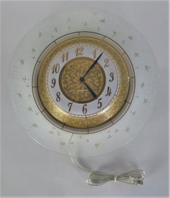 1950er Hollywood Regency Higgins-Stil General Electric Wanduhr