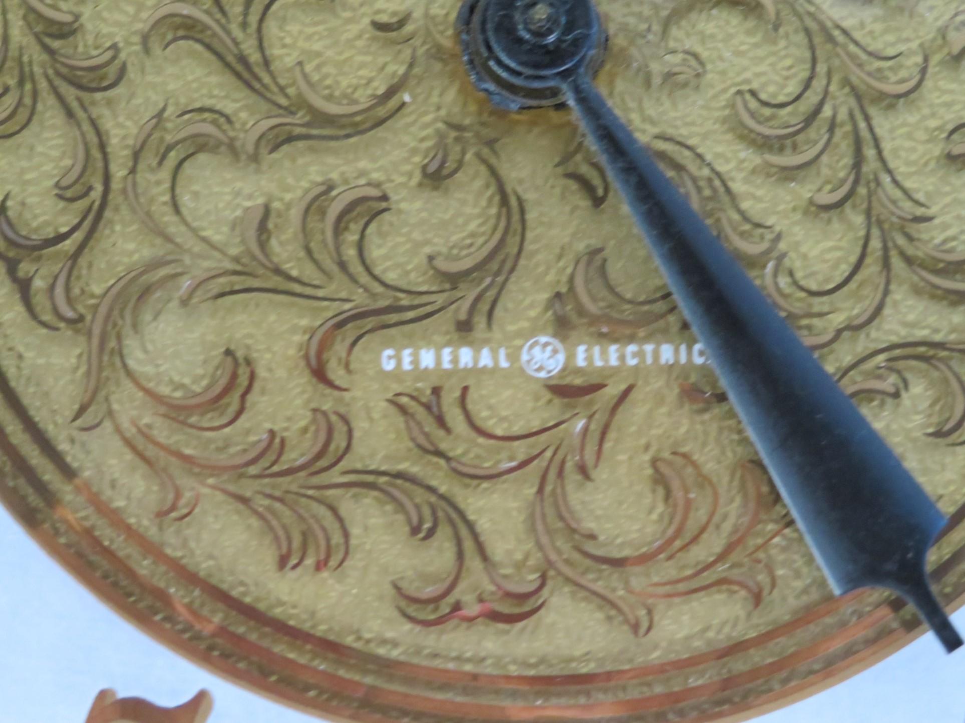 American 1950s Hollywood Regency Higgins Style General Electric Wall Clock For Sale