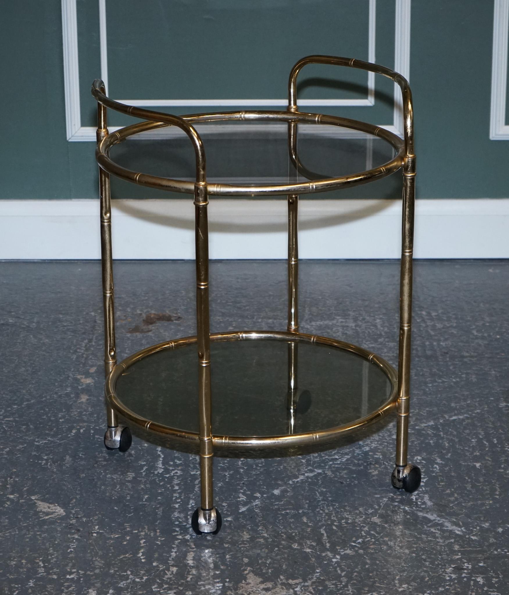 We are delighted to offer for sale this Hollywood Regency brass faux bamboo bar cart.

We have lightly restored this by cleaning it all over, lightly hand polished.

Please carefully examine the pictures to see the condition before purchasing,