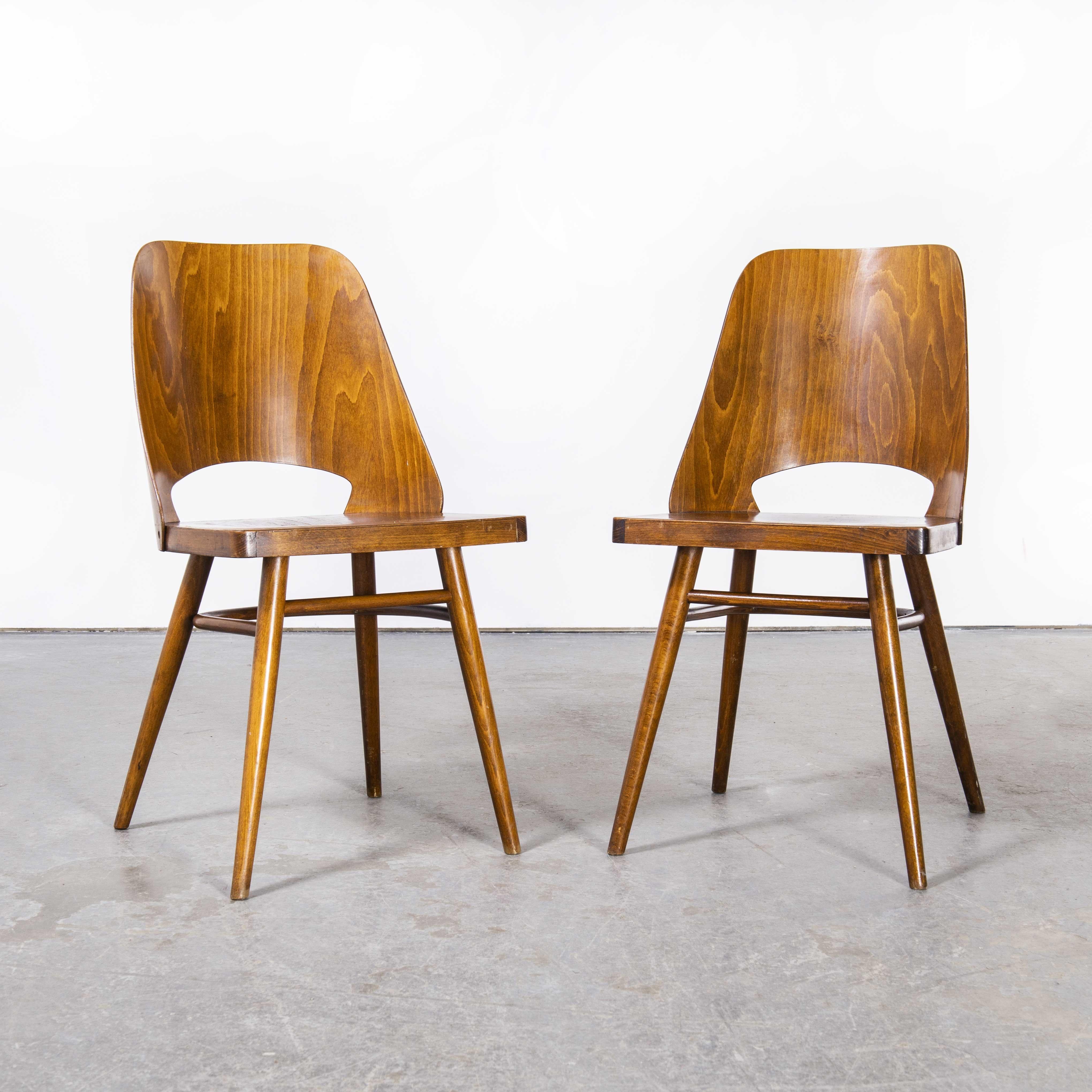1950’s Honey beech dining chairs by Radomir Hoffman – pair.
1950’s Honey beech dining chairs by Radomir Hoffman – pair. These chairs were produced by the famous Czech firm Ton, still trading today and producing beautiful chairs, they are an