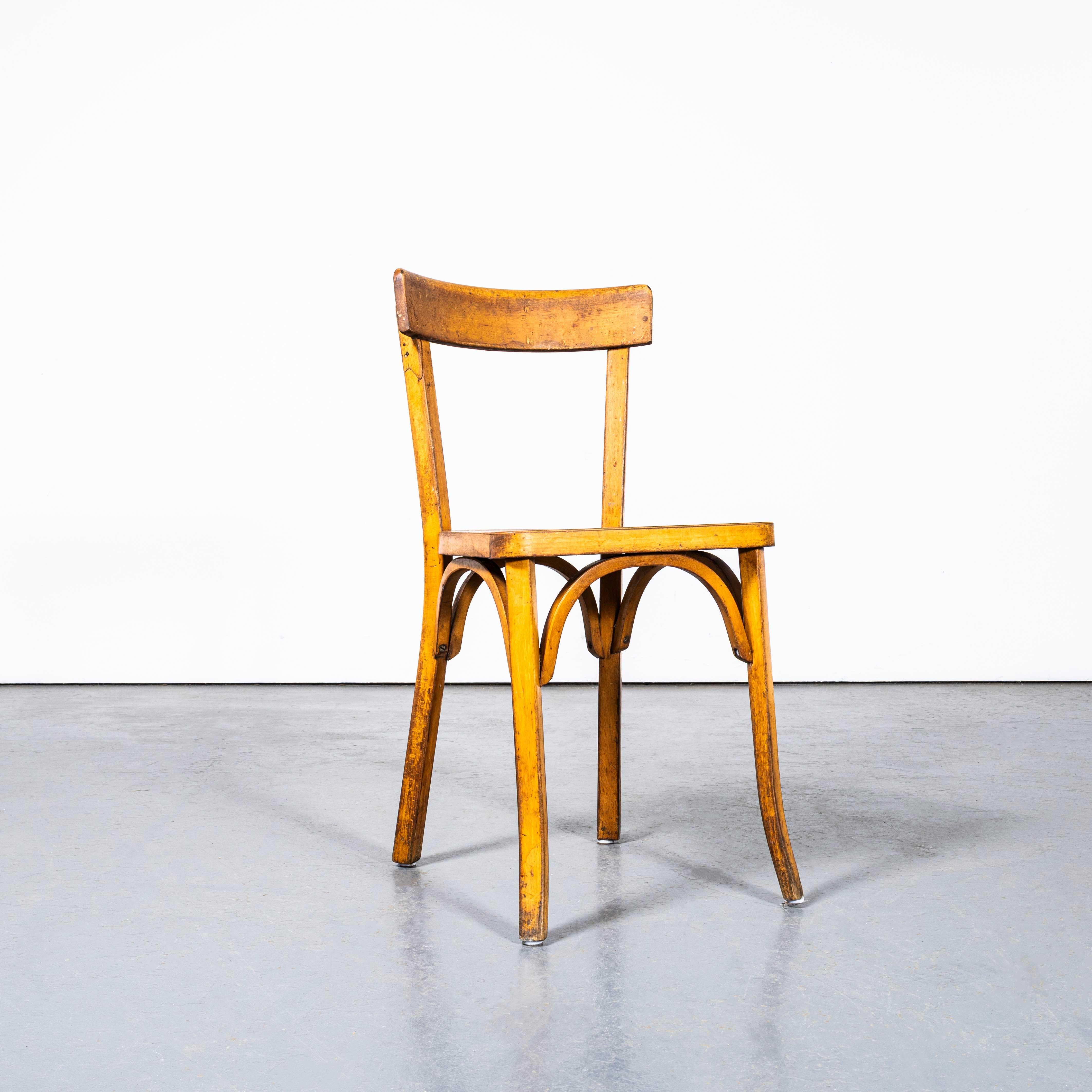 Metà XX secolo 1950's Honey Thin Slim Back Baumann Dining Chairs - Set Of Six in vendita