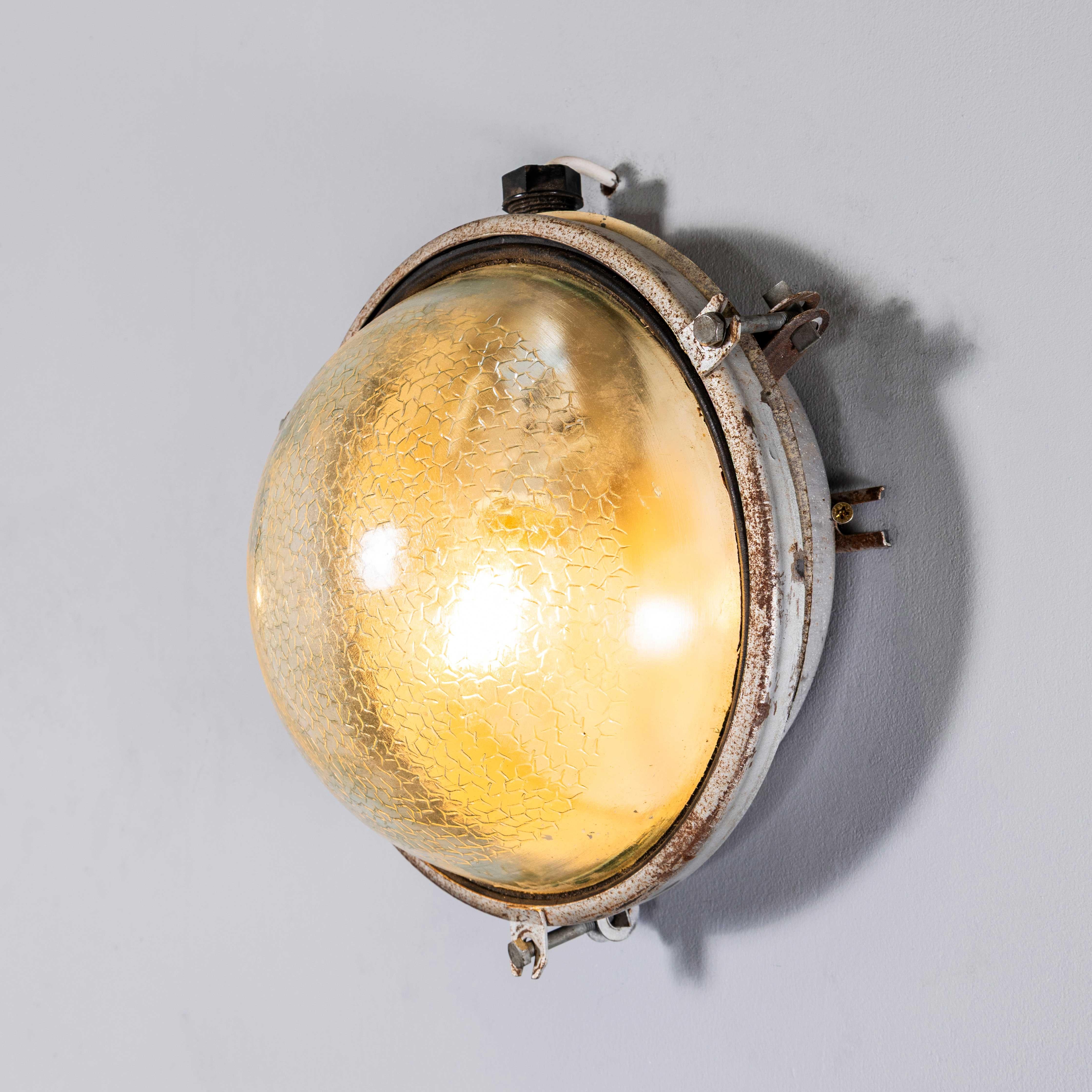 1950’s Honeycomb Patterned Bulk Head Ceiling Or Wall Lamps – Pair. 
Good quality round industrial bulkhead lamps. The lamp has been cleaned and restored and all electrical components have been removed and replaced with modern European CE standard