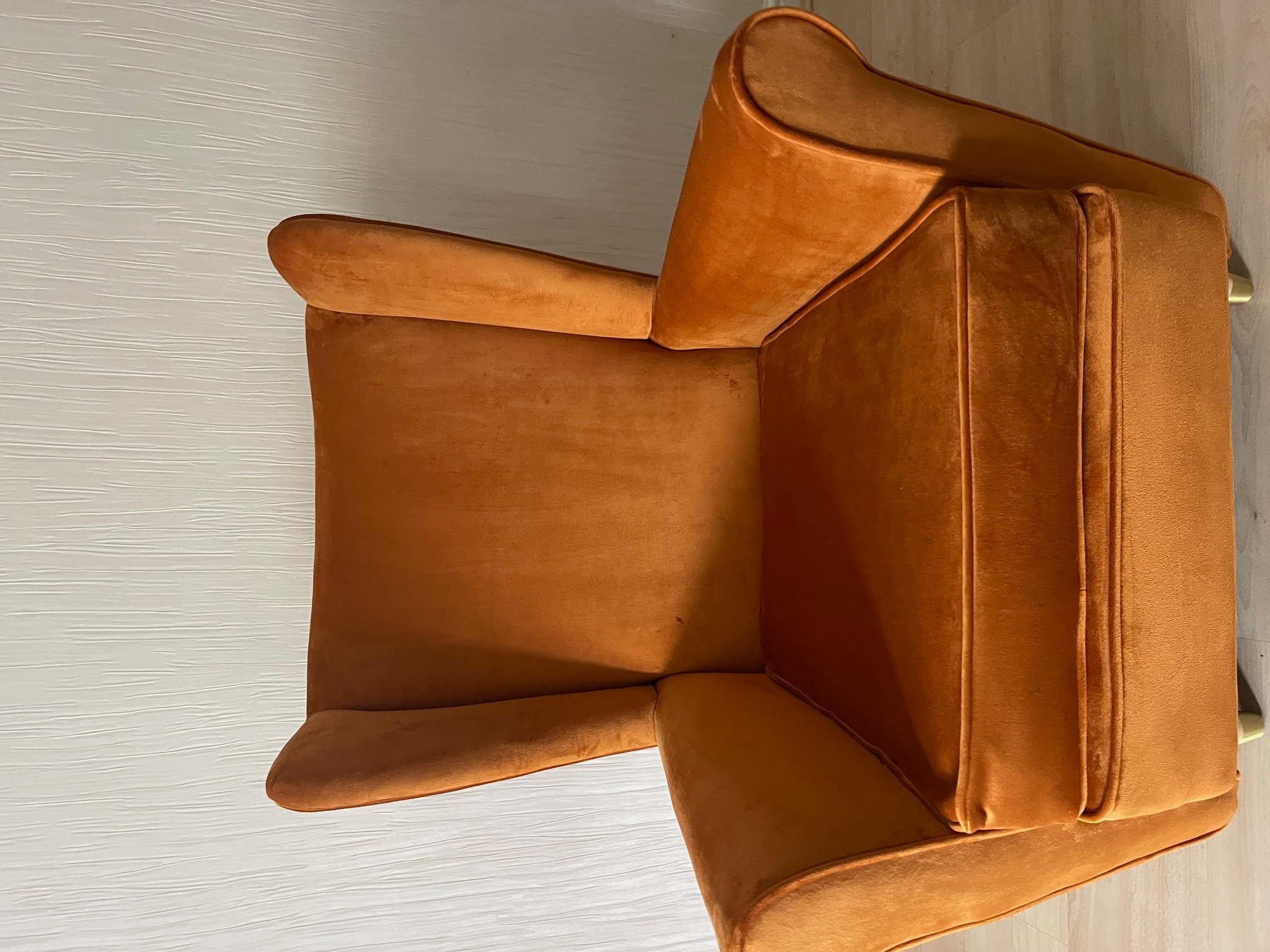 orange wingback armchair