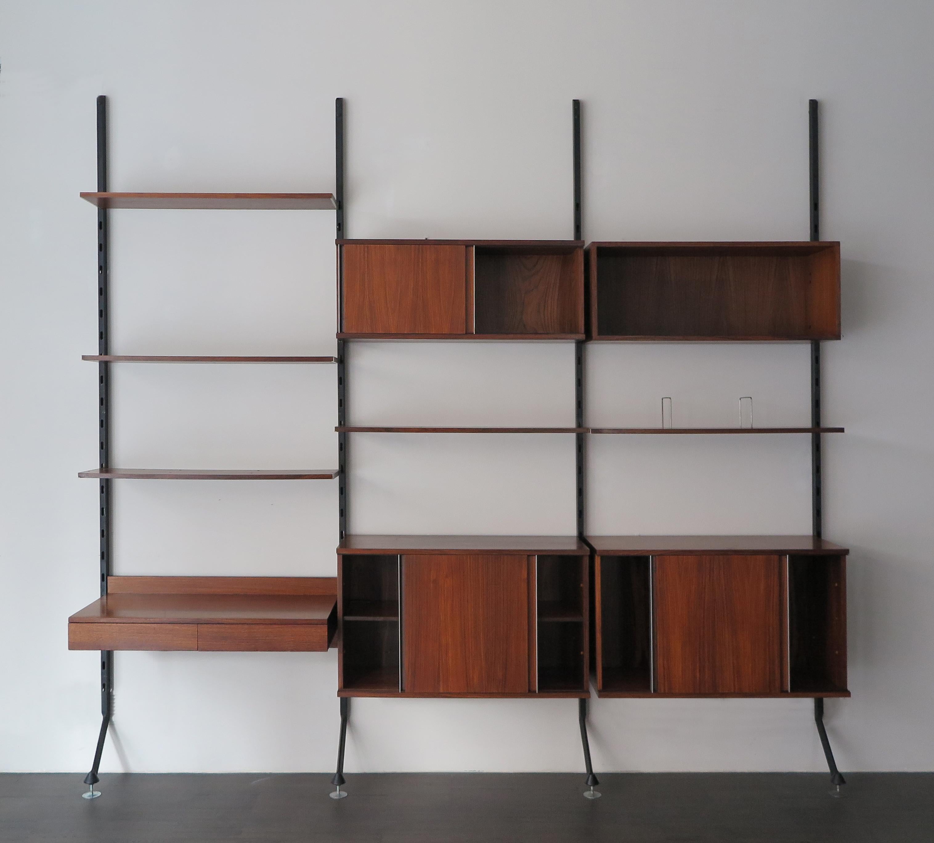 Rosewood wall unit system model Urio designed by Ico Parisi for MIM “Mobili Italiani Moderni” in 1957, all hanging pieces are veneered with real rosewood and feature handles and decorations made of aluminium and manufacturer's