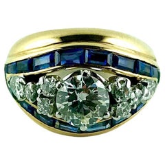 Used 1950s Illario Yellow Gold, Diamonds and Natural Sapphires Ring