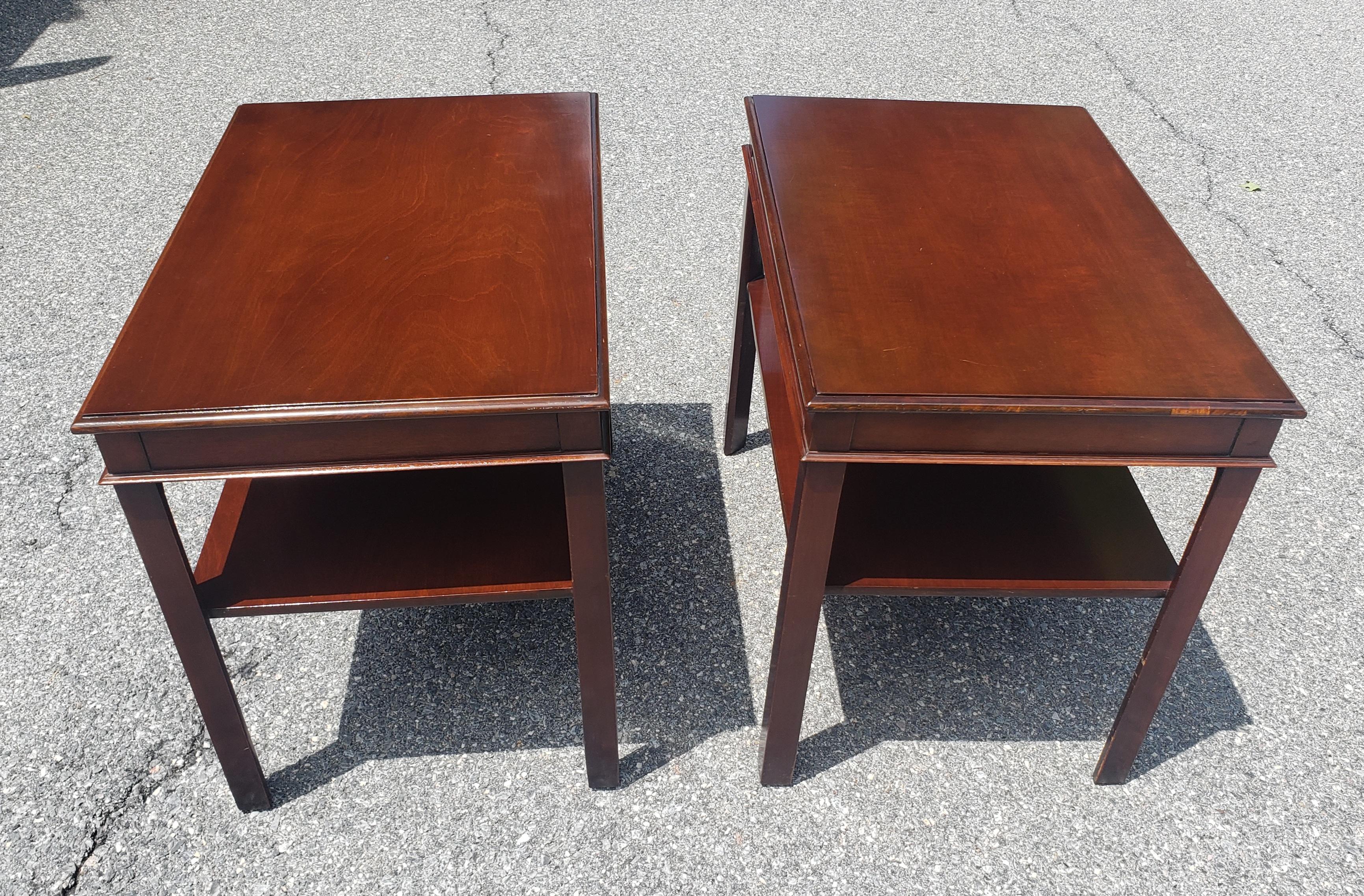 A pair of 1950s pure genuine Mahogany two tier side tables by Imperial Furniture Grand Rapids.
Recently refinished and gorgeous. Simple, yet elegant contruction. Q