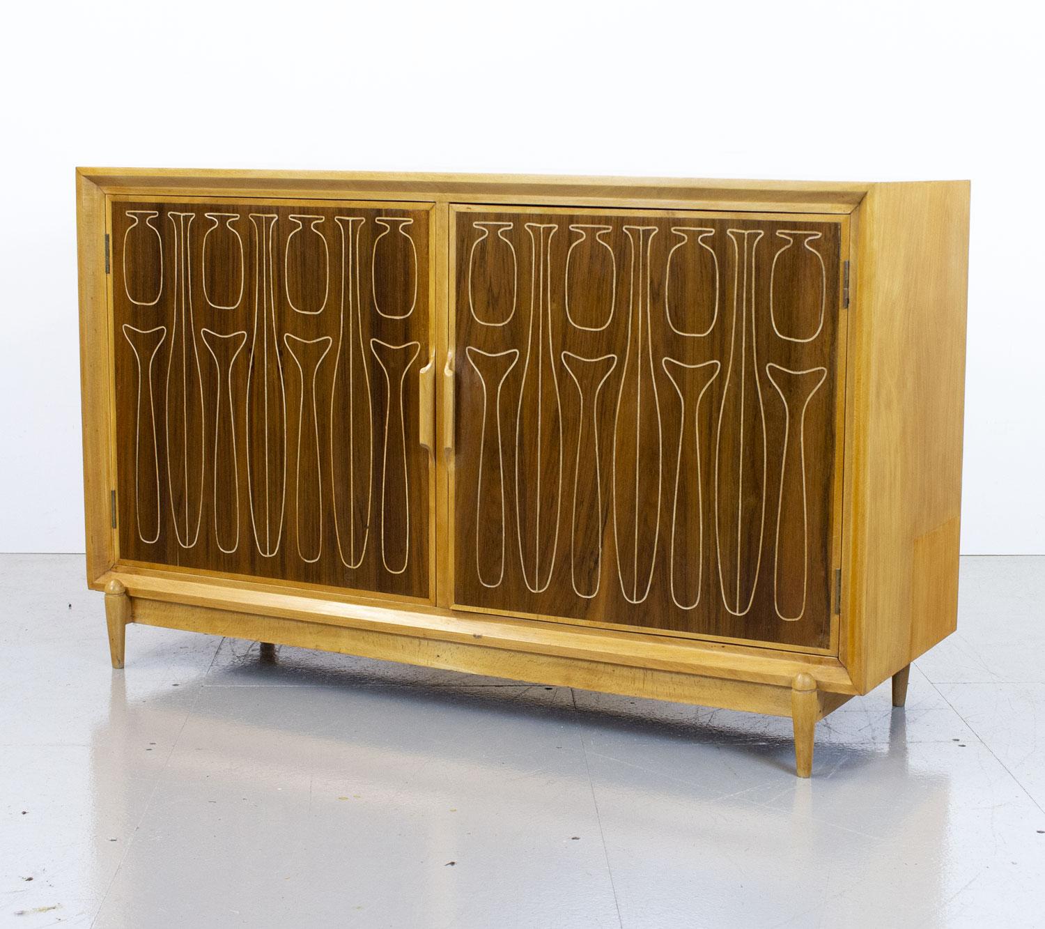 Very rare and super stylish sideboard designed by Kelvin McAvoy for the Liberty & Co luxury department store in London. Kelvin McAvoy was an interior designer and painter who studied at the Glasgow School of Art. As a student he became acquainted