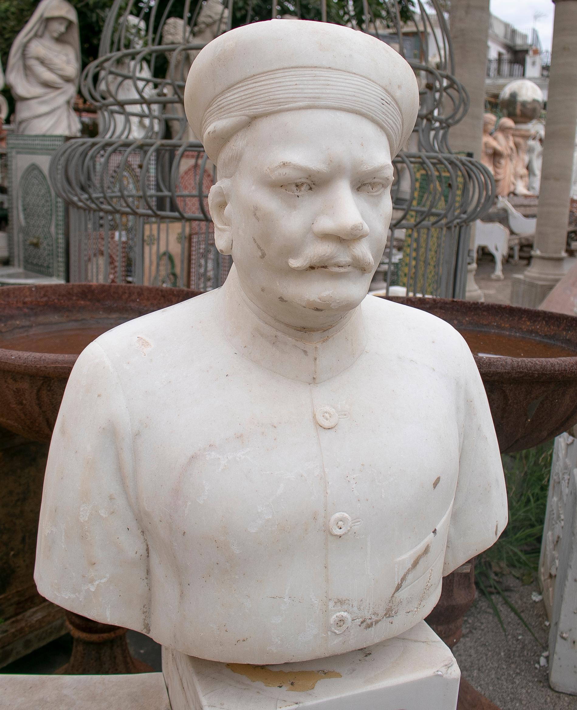 1950s Indian hand carved white marble bust of a nobleman with hat. 

It comes from the collection of a Spanish aristocratic family in Madrid.