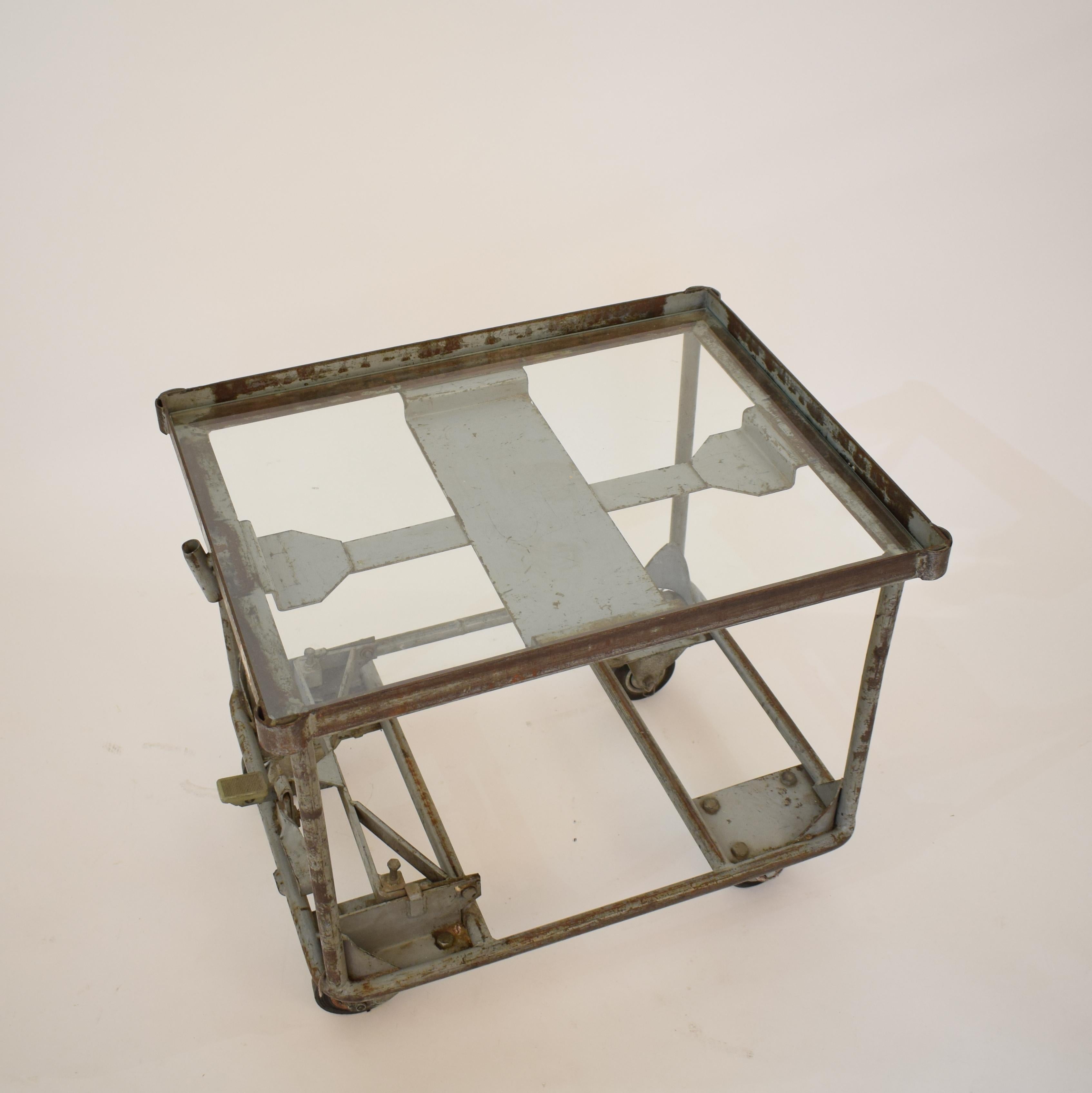 This 1950s industrial bar cart or sofa table was original a German mail trolley.
A great eye-catcher for your interior.
 