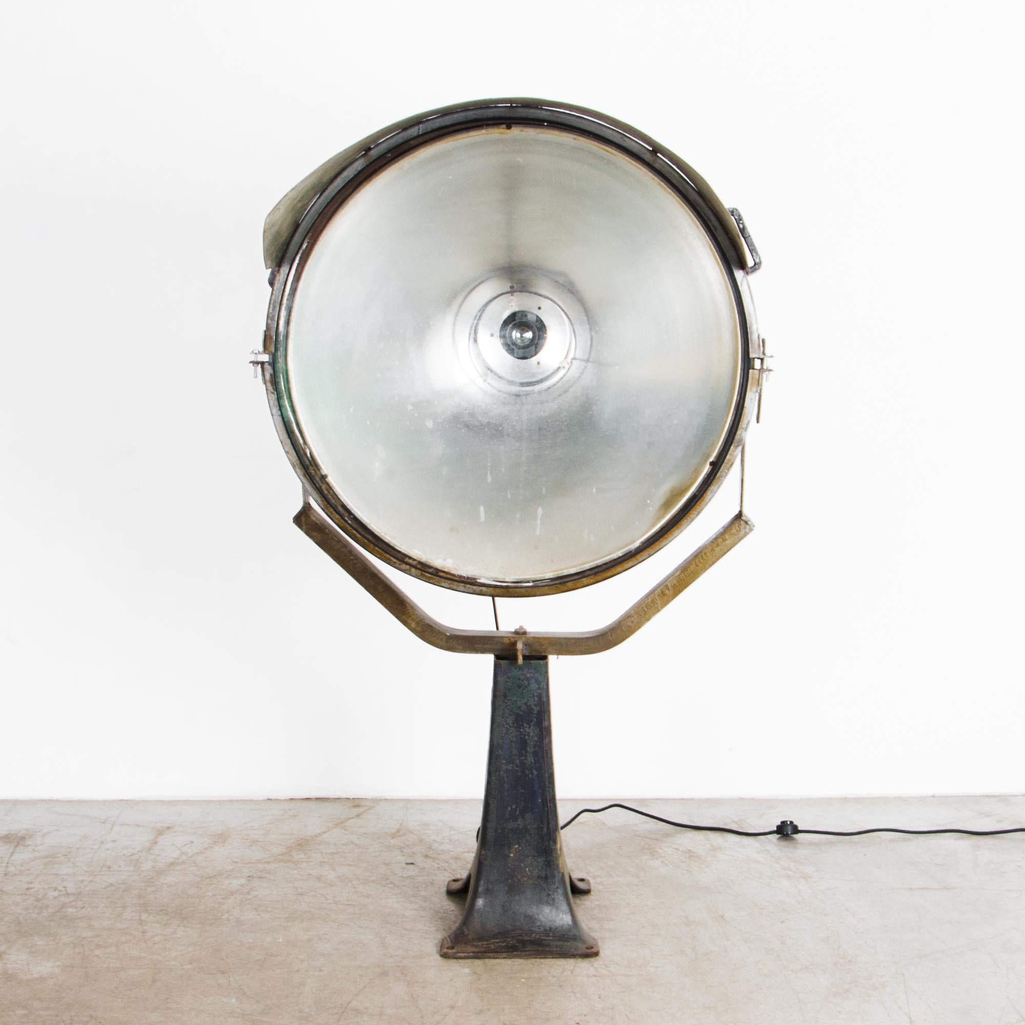 An industrial scale lighting fixture from Czech Republic, circa 1950. Updated and rewired for an interior setting, this lamp was originally used for architectural spotlighting. Beautiful textured patina shows the age, an embedded history of past