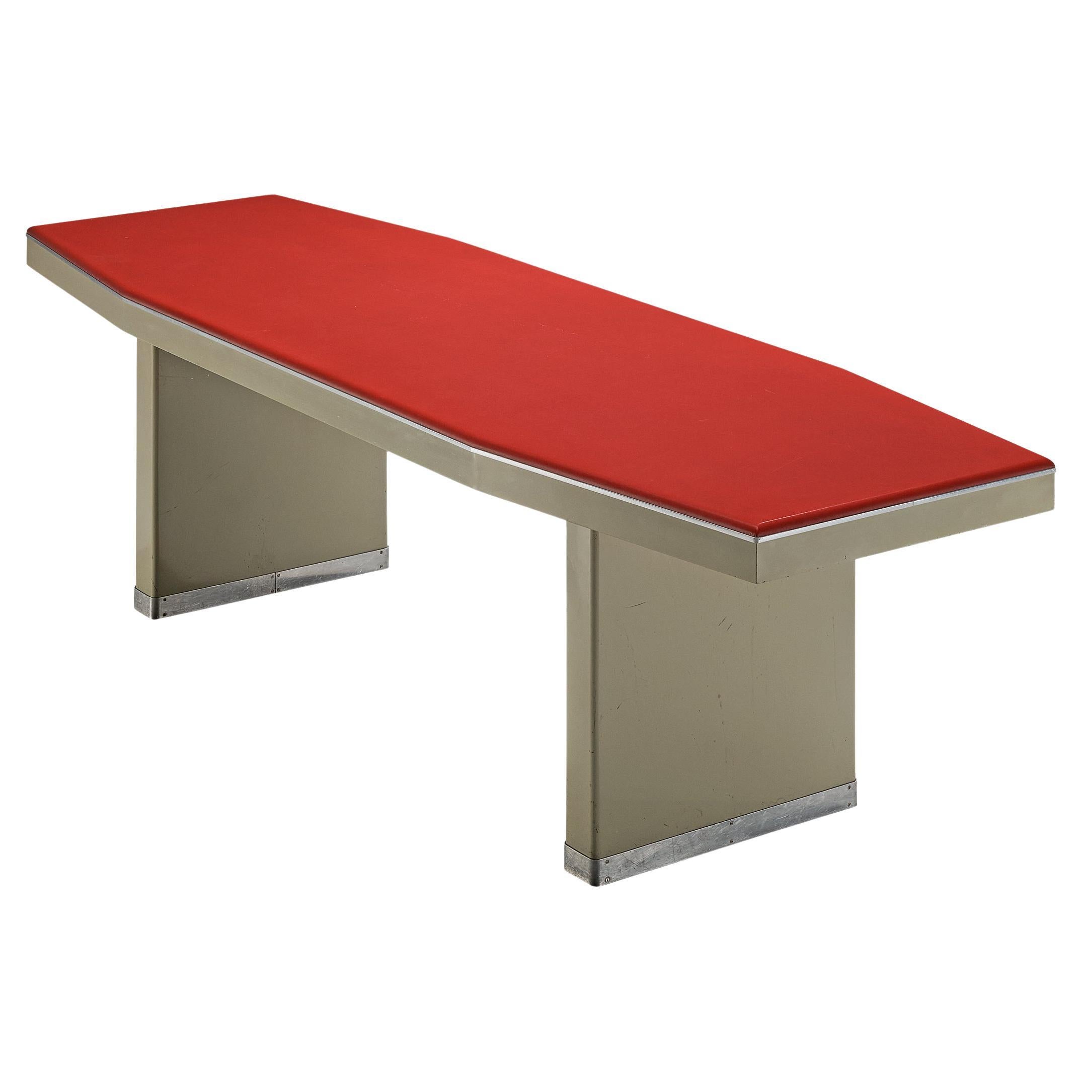Dining or work table, lacquered steel, aluminum, faux leather, Italy, 1950s

This striking 1950s Italian design has a convinced appearance due to the vivid geometry and juxtaposition of various materials and colors. The tabletop is an elongated