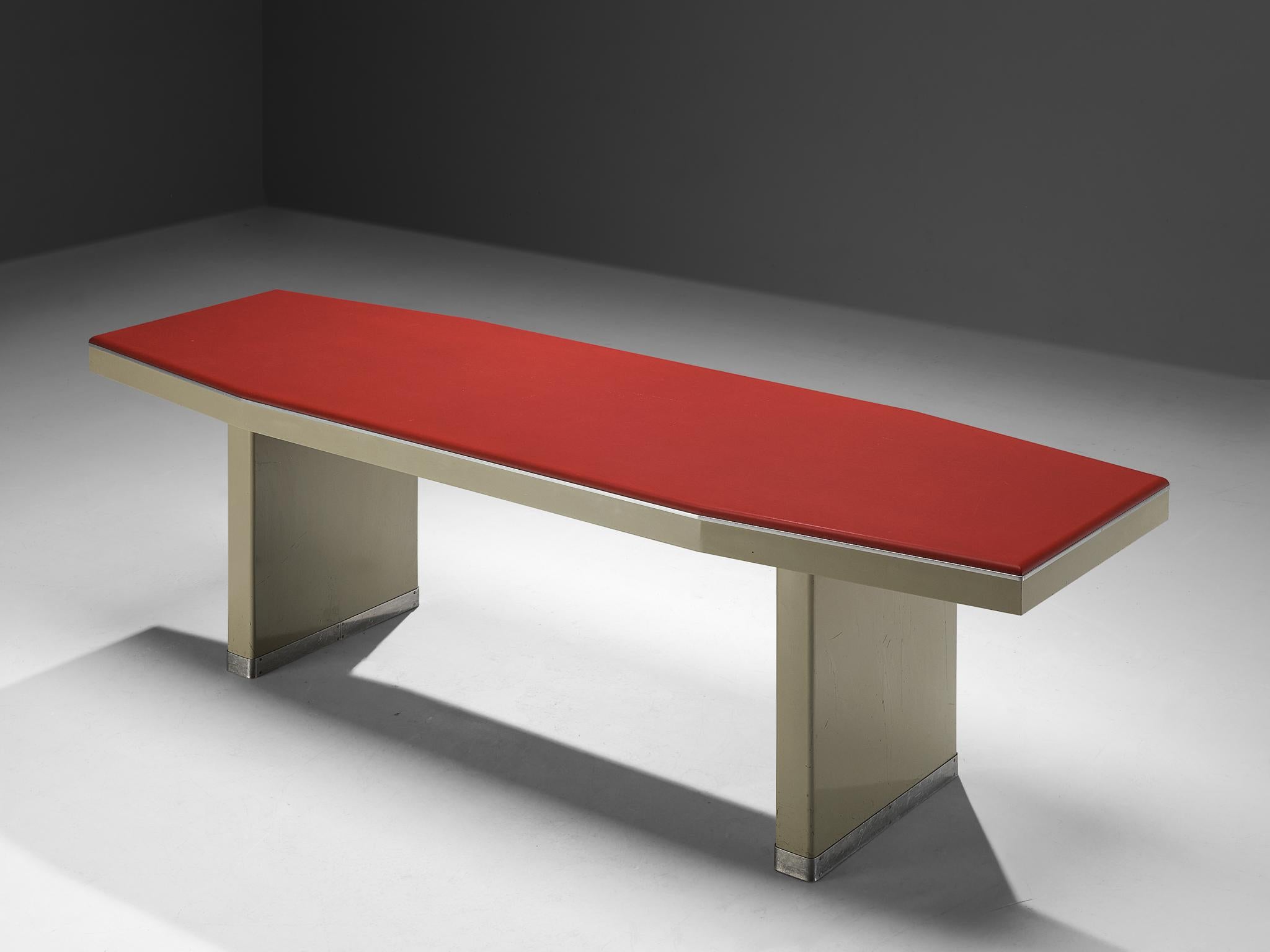 Dining or work table, lacquered steel, aluminum, faux leather, Italy, 1950s

This striking 1950s Italian design has a convinced appearance due to the vivid geometry and juxtaposition of various materials and colors. The tabletop is an elongated