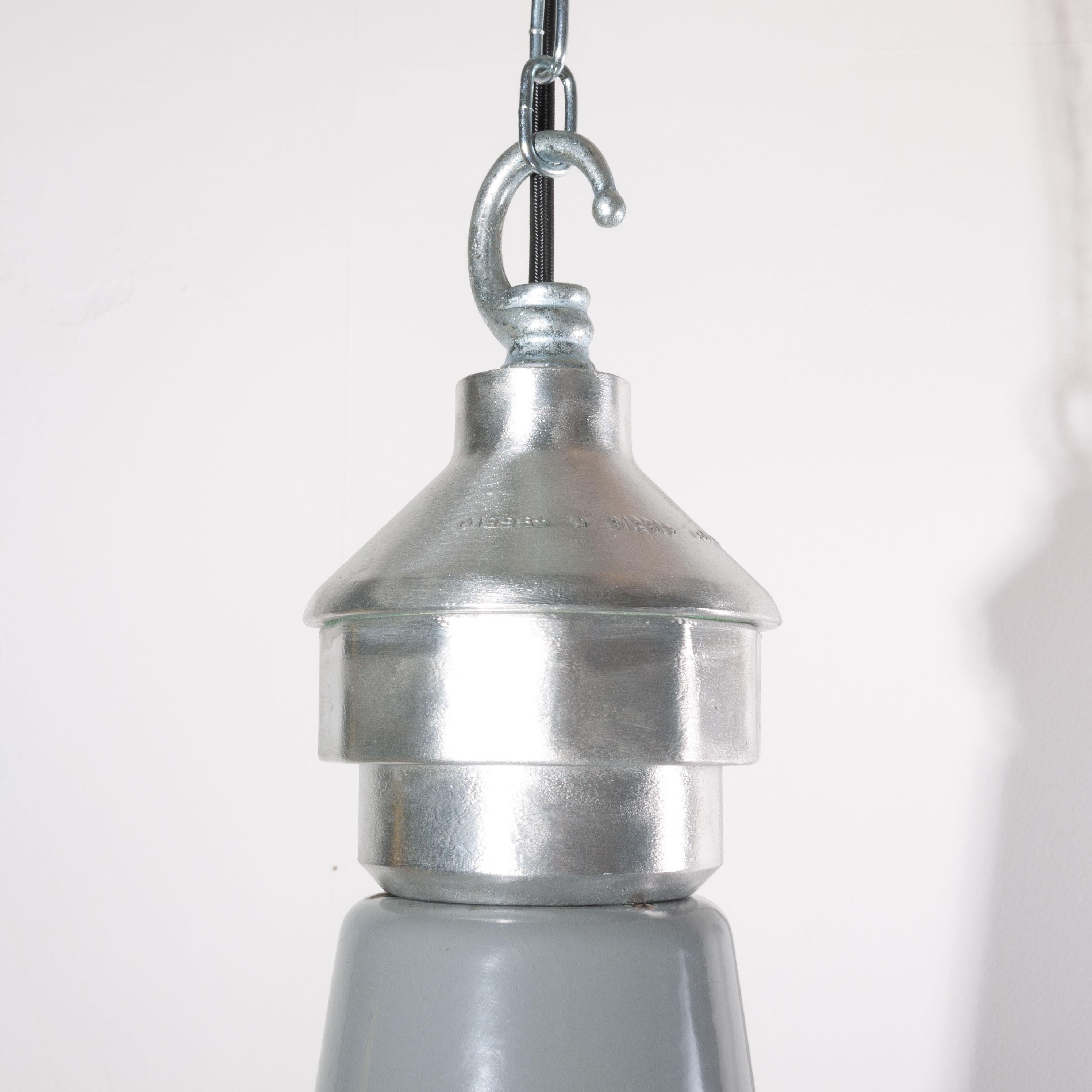 1950s Industrial large Benjamin enameled hanging ceiling pendant lamps/lights
1950s Industrial large Benjamin enameled hanging ceiling pendant lamps/lights. Benjamin was arguably the market leader in Industrial lighting in the 1930s through to