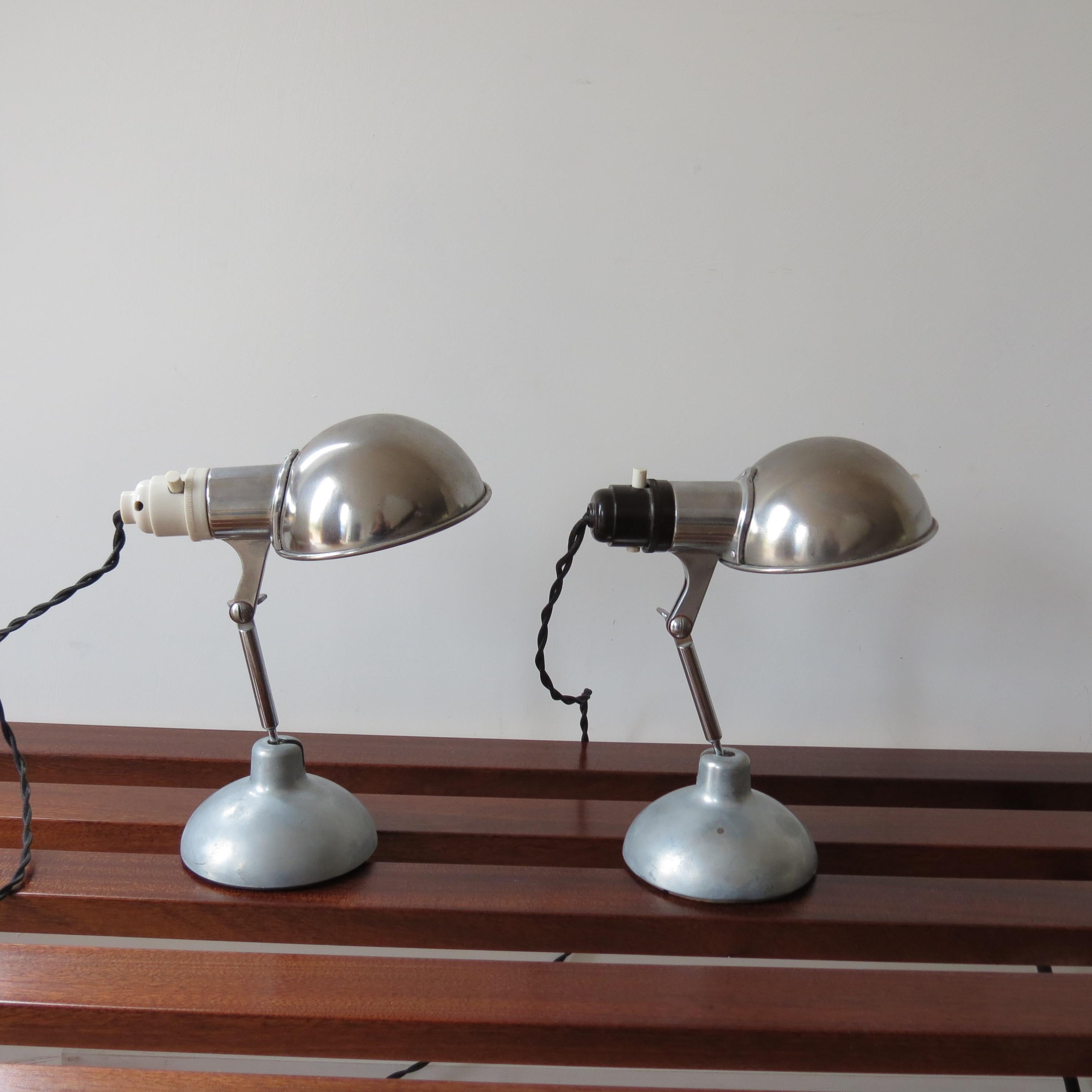 Wonderful desk lamp by Metek England from the 1950s. Made from polished aluminium with steel rod upright, bakelite lamp fitting, newly rewired. Designed originally as a travel lamp, its fully manoeuvrable to many different positions and it retains