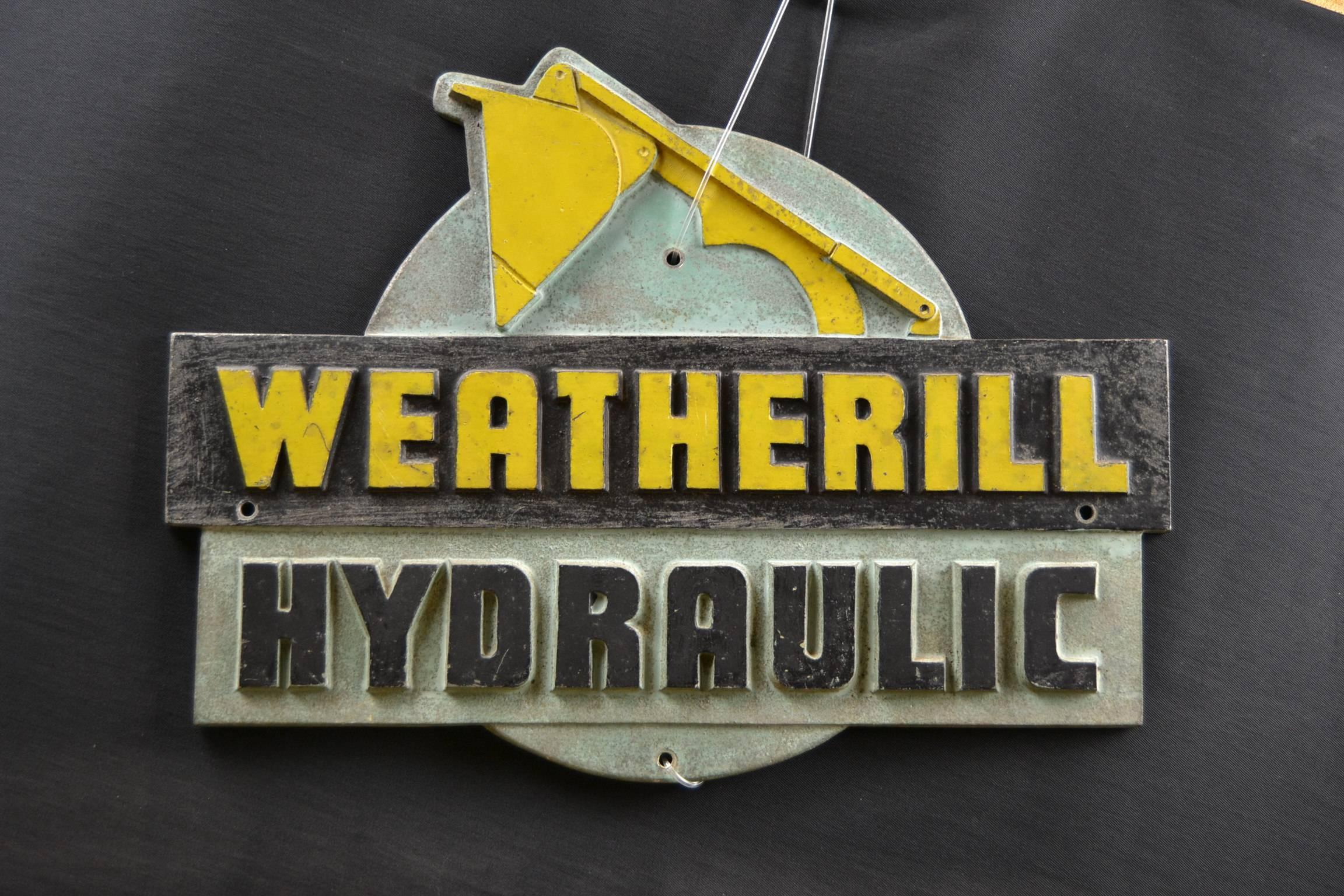 Old Industrial badge for Fred Weatherill Hydraulic loading Shovel Machine. 
This cast iron sign dates from the 1950s.
This Art Deco Sign is made of cast iron and still in perfect condition.
The sign - logo was used to be placed on the back of the