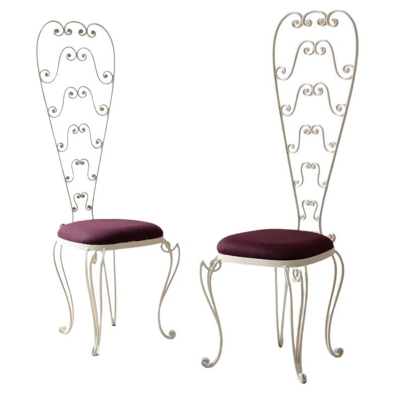 1950
s iron chairs with decorated high backs For Sale