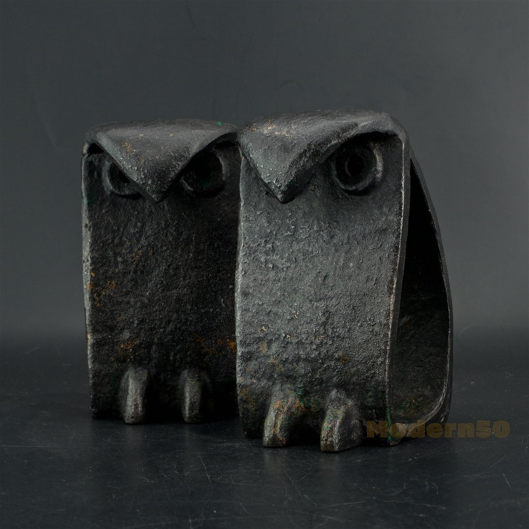 Pair of heavy welded metal abstract bird sculptures. Some remnants of greenish patina on steel. Made in Japan. Cleaned and waxed. Each bird is 6 inches High and weighs 3.35 lbs.