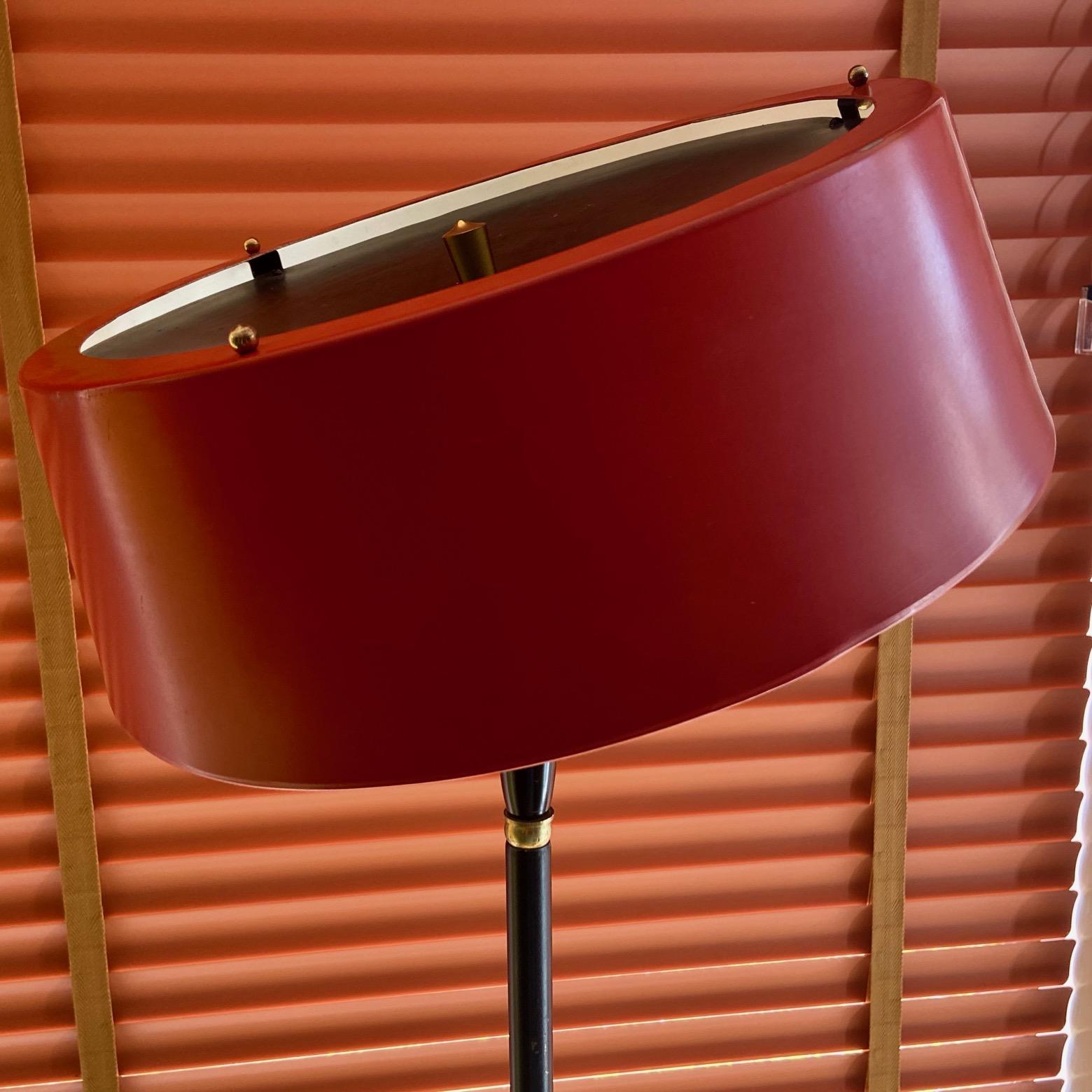 20th Century 1950's Italian black and brass floor lamp with tilting red shade, manner of Lumi For Sale