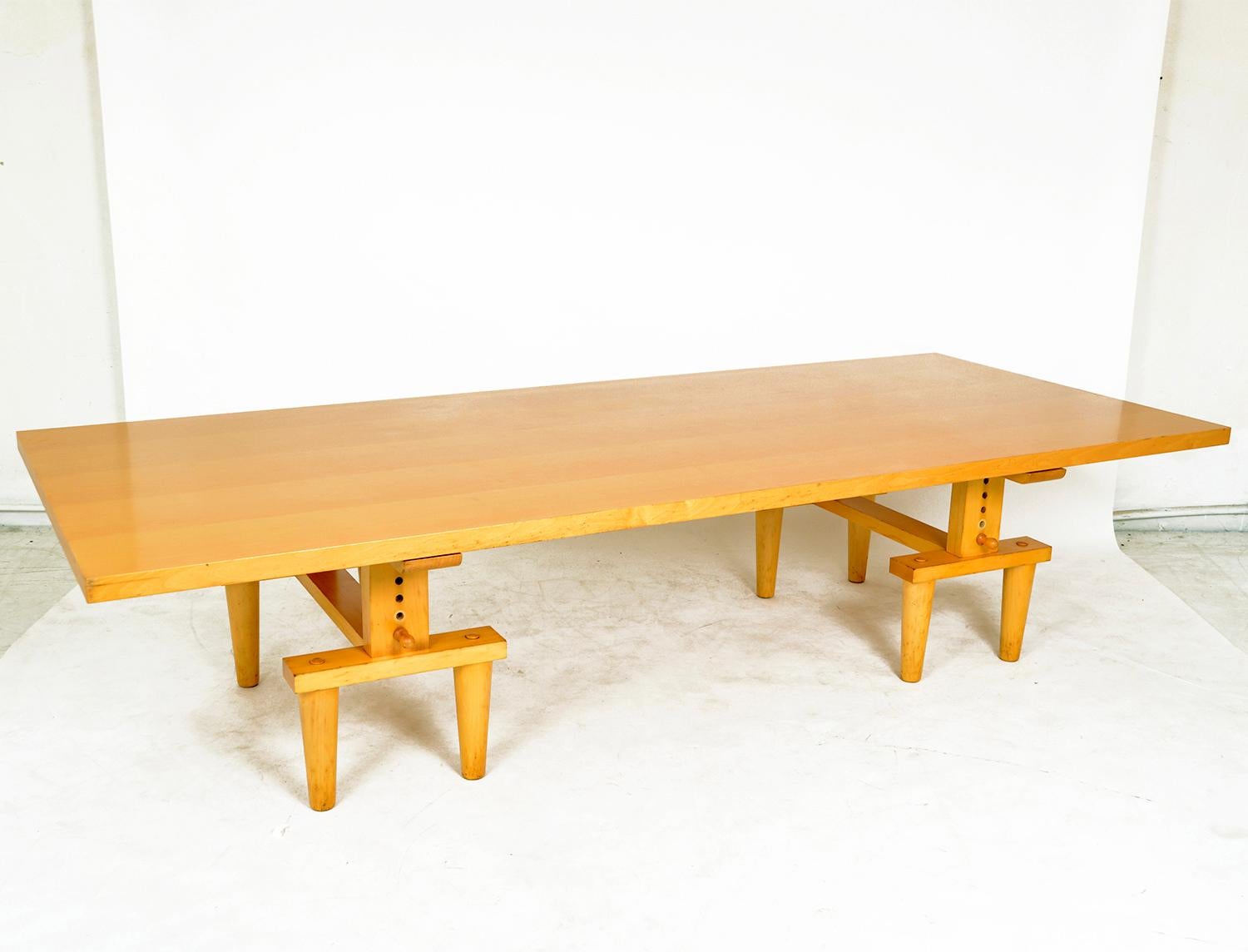 An opportunity to buy a rare and substantially sized ‘2630 Bramante’ trestle table originally designed in 1950 by Achille & Pier Giacomo Castiglioni for Zanotta, Italy. A reversible beech wooden top, sits upon a pair of solid beech trestle bases.