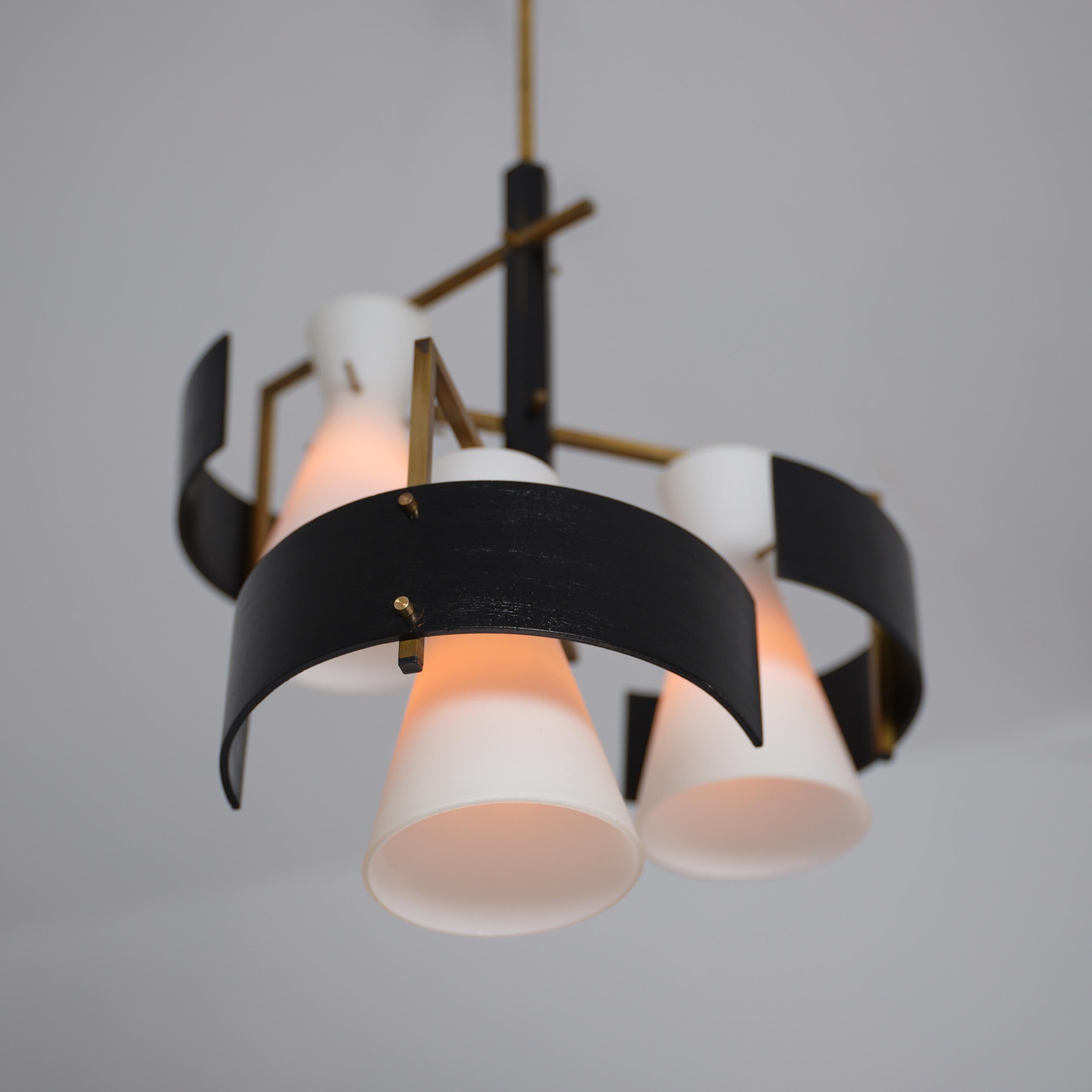 Metallo 1950s Italian Brass & Black-Lacquered Chandelier with Opaline Glass Shades in vendita