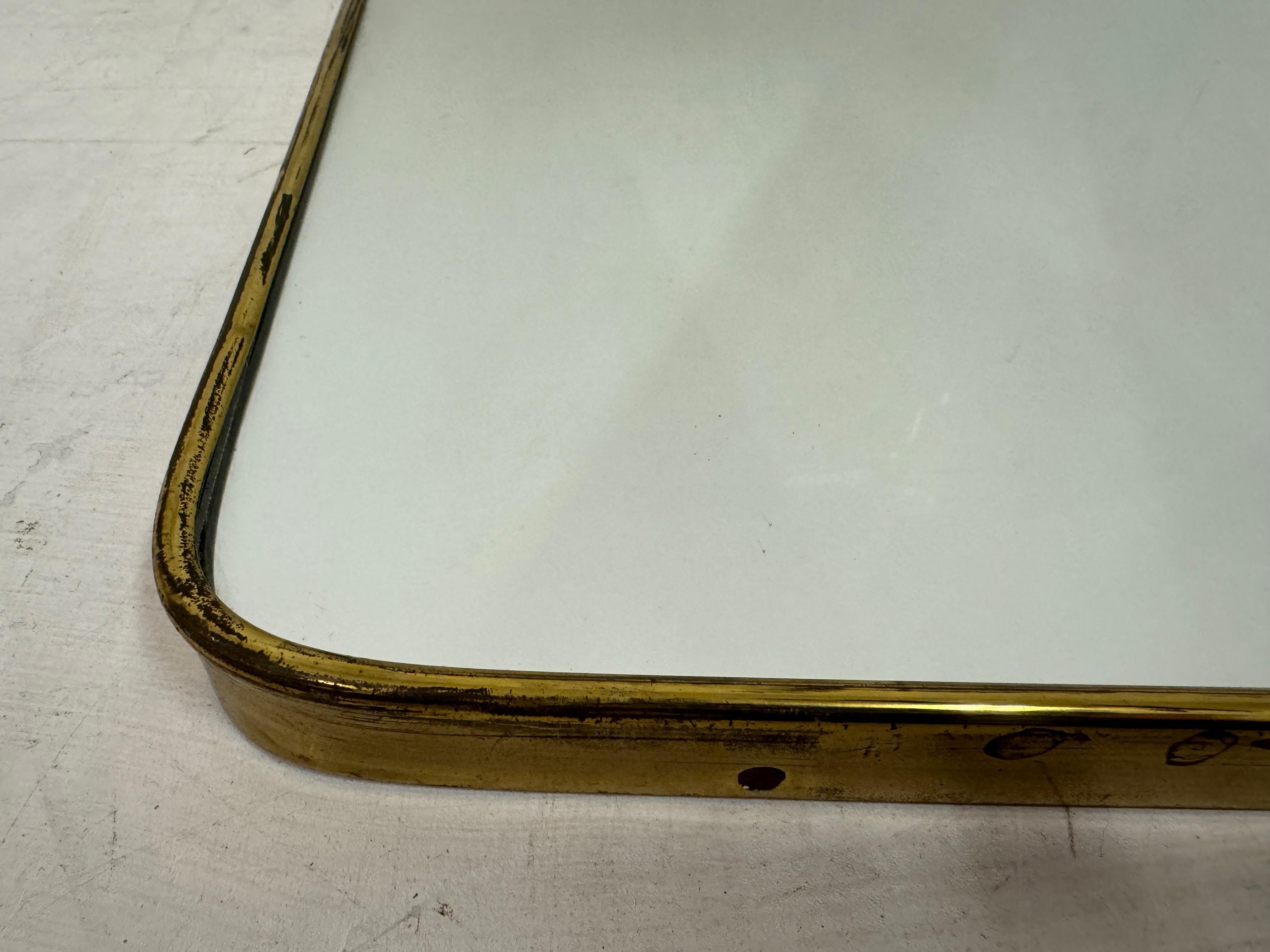 Mid-Century Modern 1950s Italian Brass Mirror with Squiggle For Sale