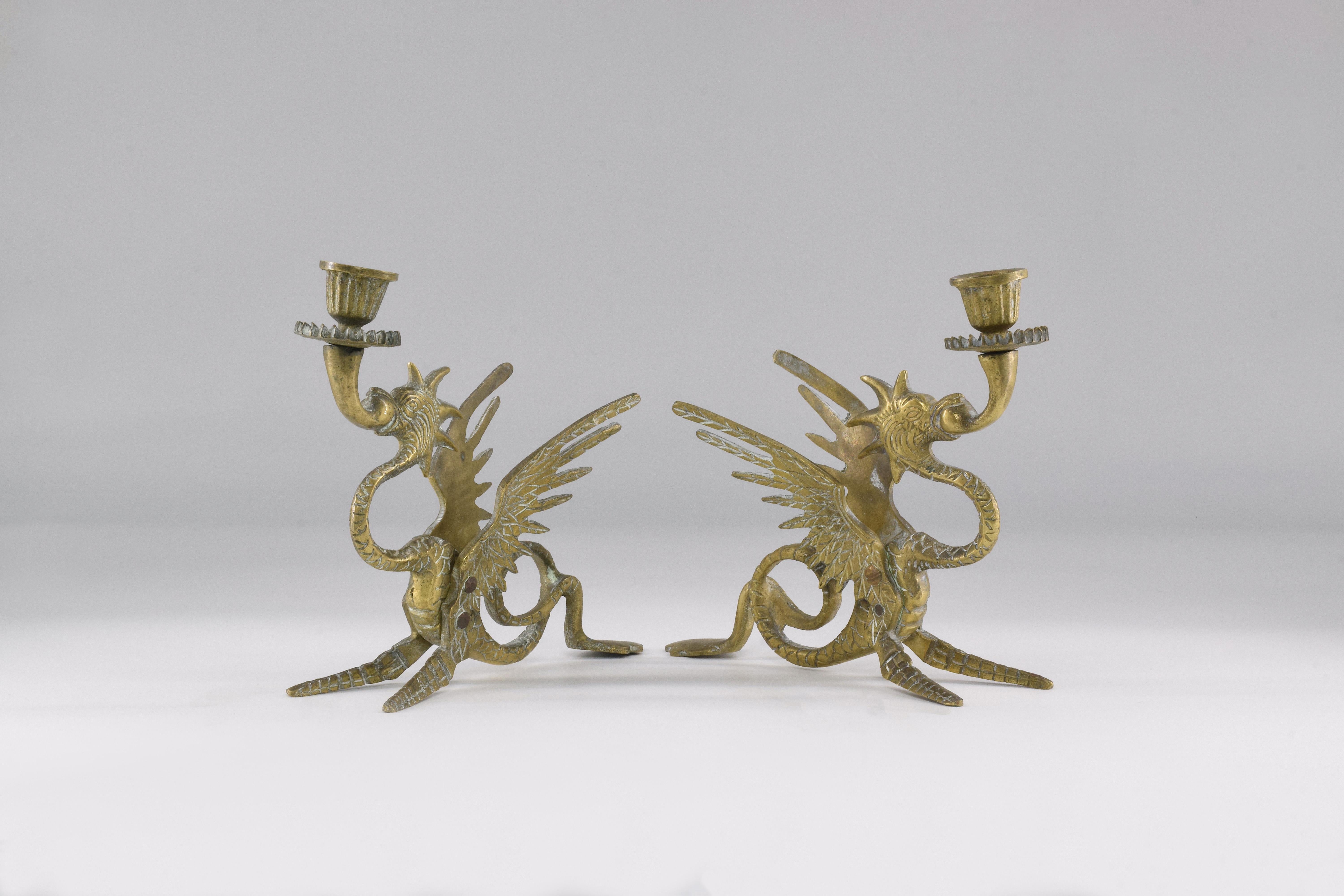 A 20th century set of two very unique Italian bronze candlesticks shaped in the form of dragons. 
Italy. 1950's.