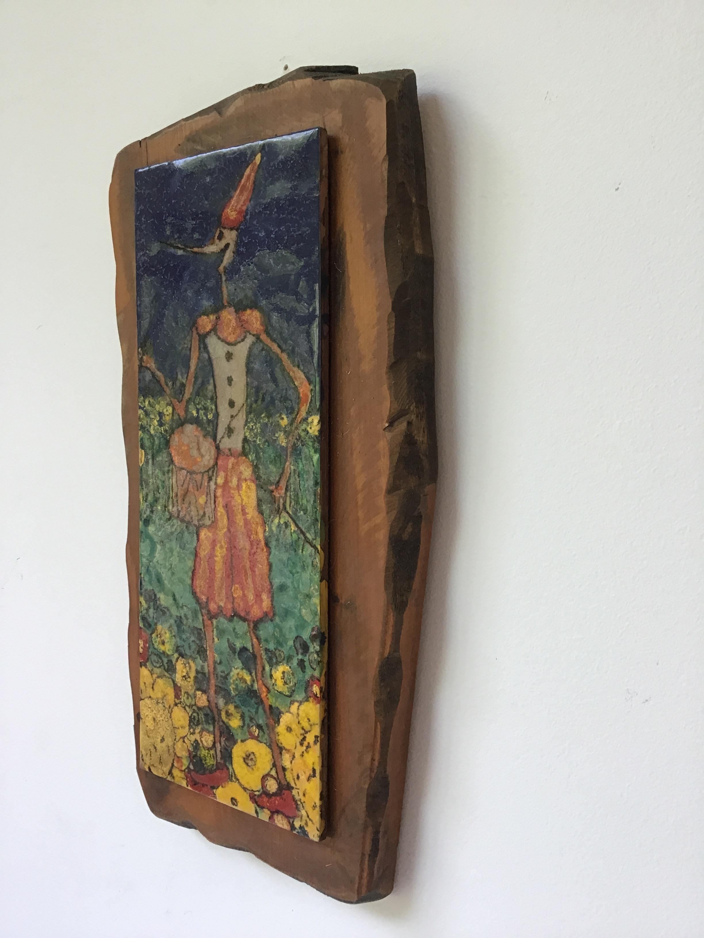 1950s Italian ceramic plaque mounted on wood of a drummer boy.