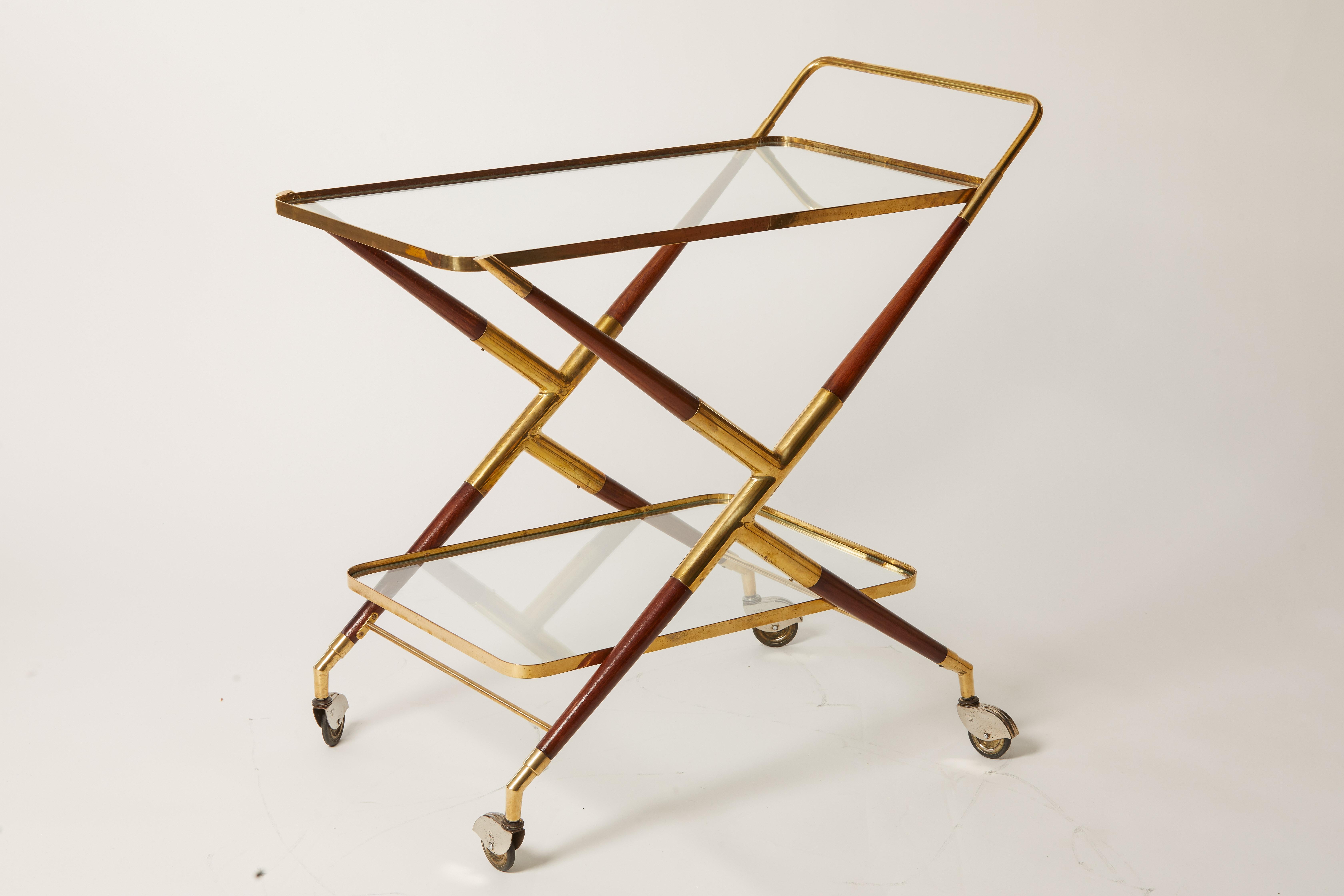 1950s Italian Cesare Lacca brass, walnut  and glass drinks cart. Documented piece 
Width 29.5 is to the handle.
Bottom shelf W: 21