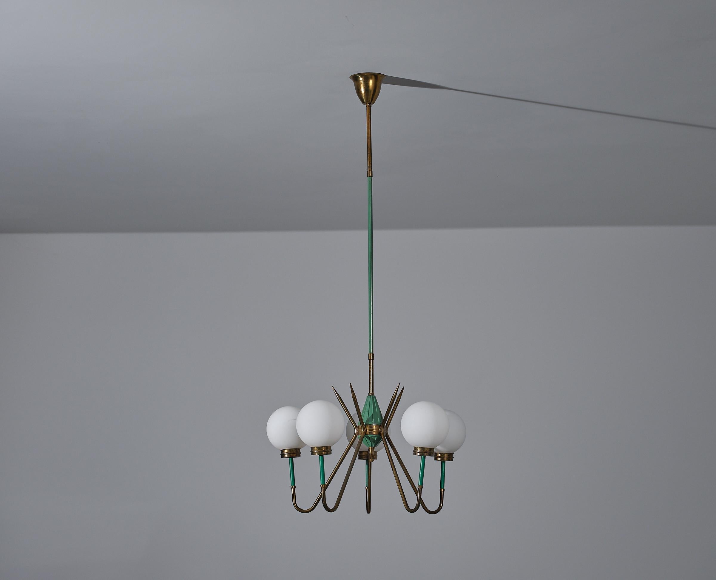 Presenting the refined charm of this 1950s Italian design 5-light chandelier. This elegant piece embodies the essence of mid-century modernity, featuring a sophisticated structure with 5 opaline glass diffusers that radiate a soft and precious
