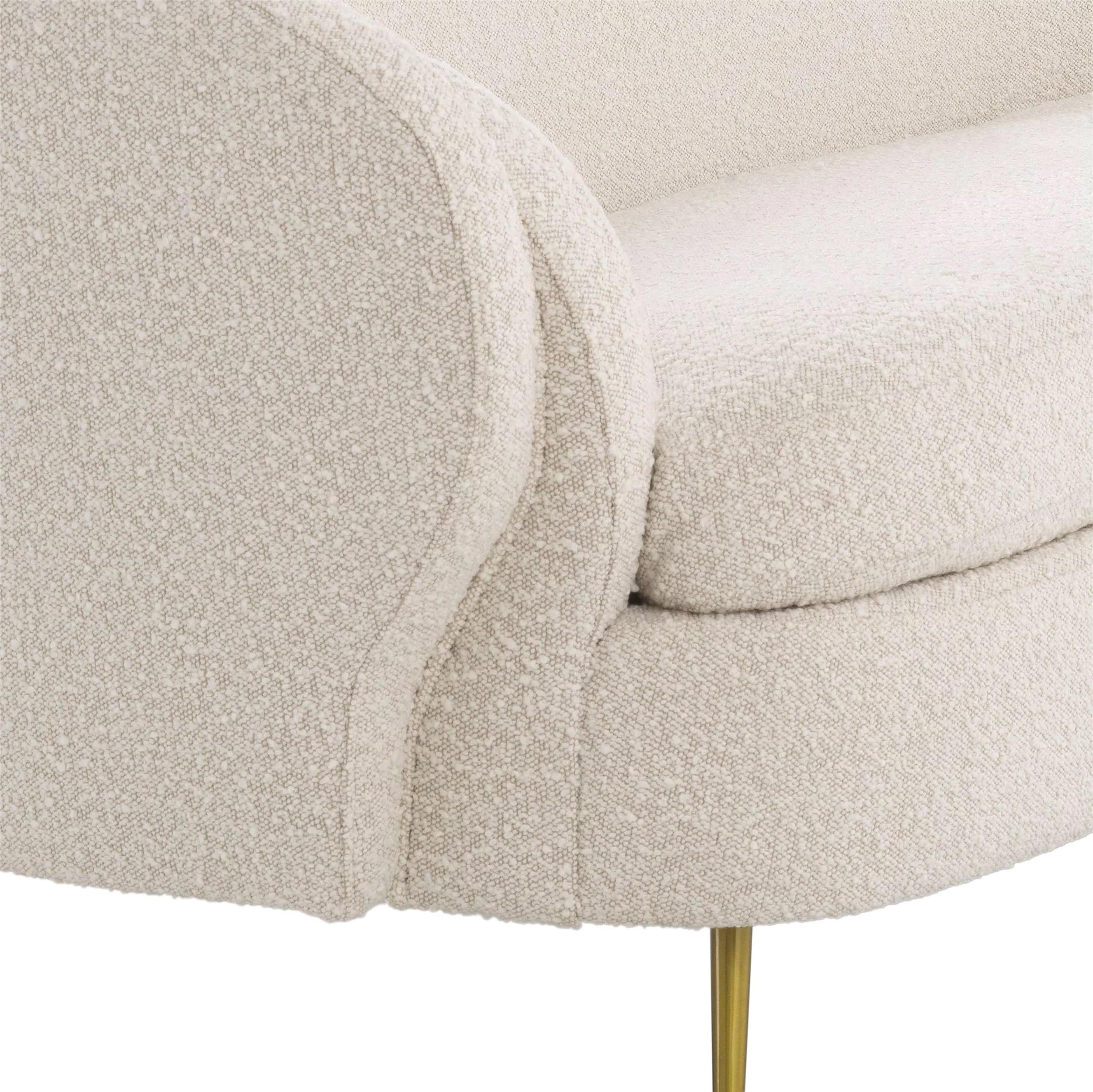 Welcoming and rounded shaped sofa in an Italian 1950s Design Look with beige bouclé fabric with brass finishes feet.