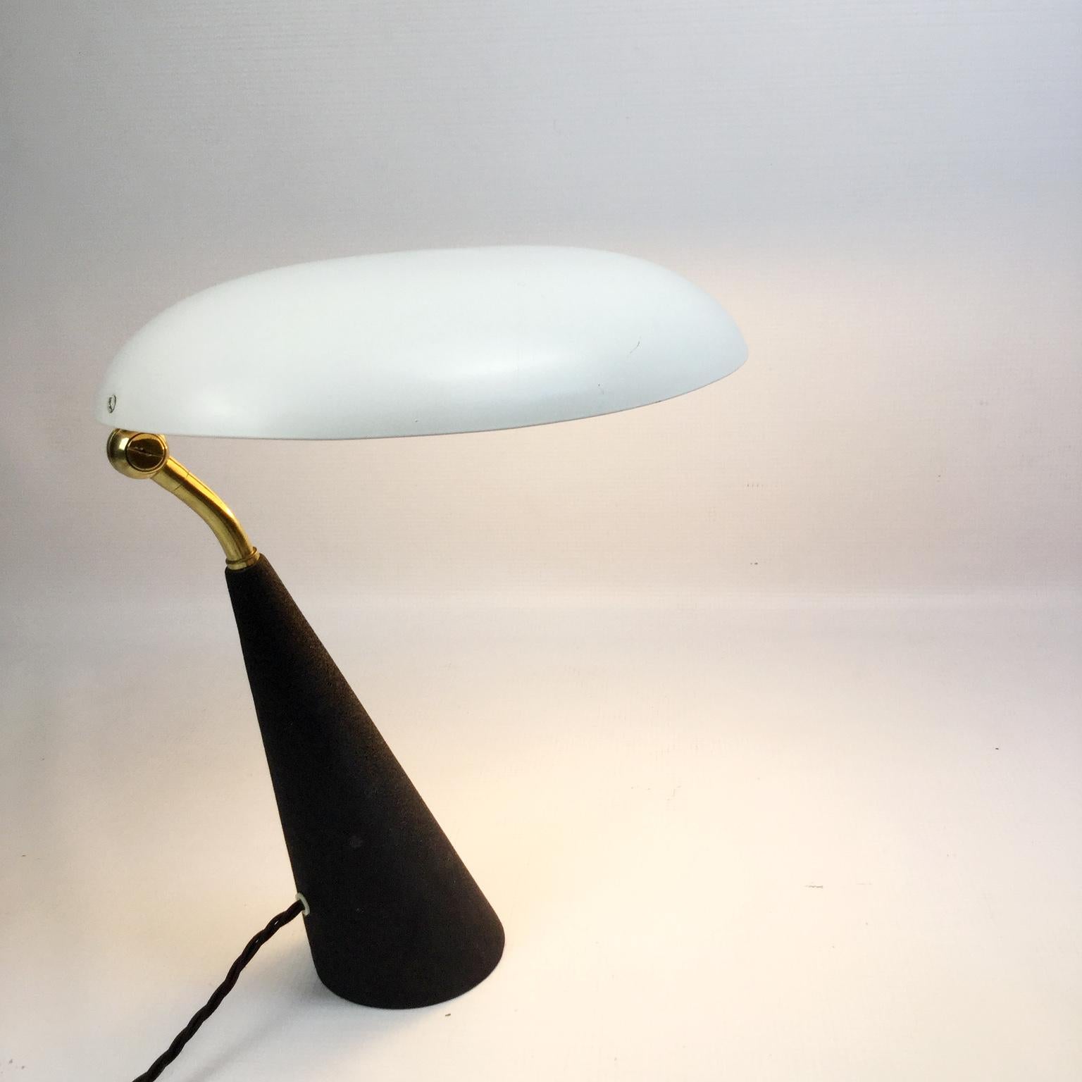 1950s Italian table lamp with adjustable shade 
Rewired with black cotton-insulated cable
Original bakelite socket including on and off switch.