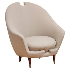 Gepolsterter, geschwungener Loungesessel von Federico Munari, Italien, 1950er Jahre