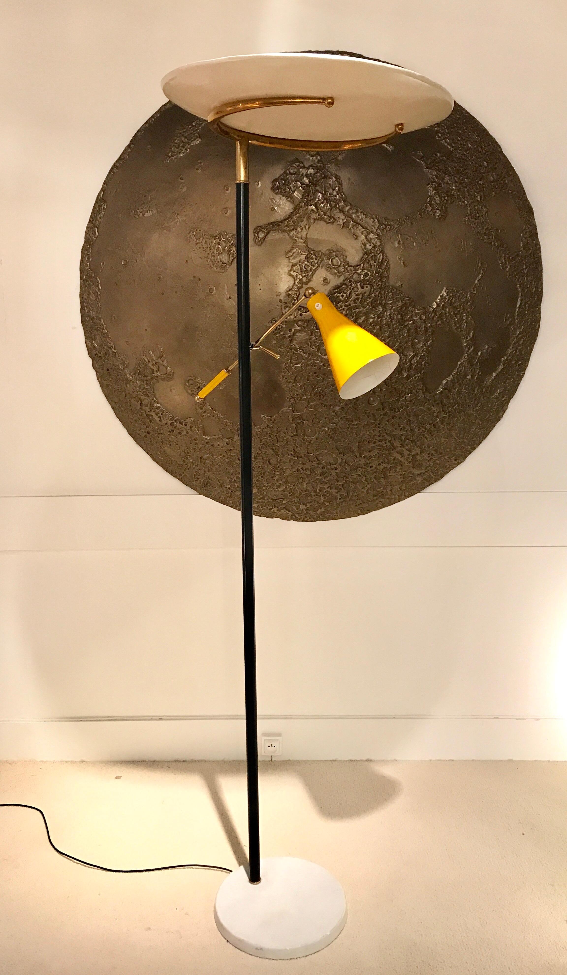 1950s Italian floor lamp by Lumen.
Brass details and white marble base
Yellow adjustable arm
360 degrees rotating white top shade
Vintage condition
Rewired.
        