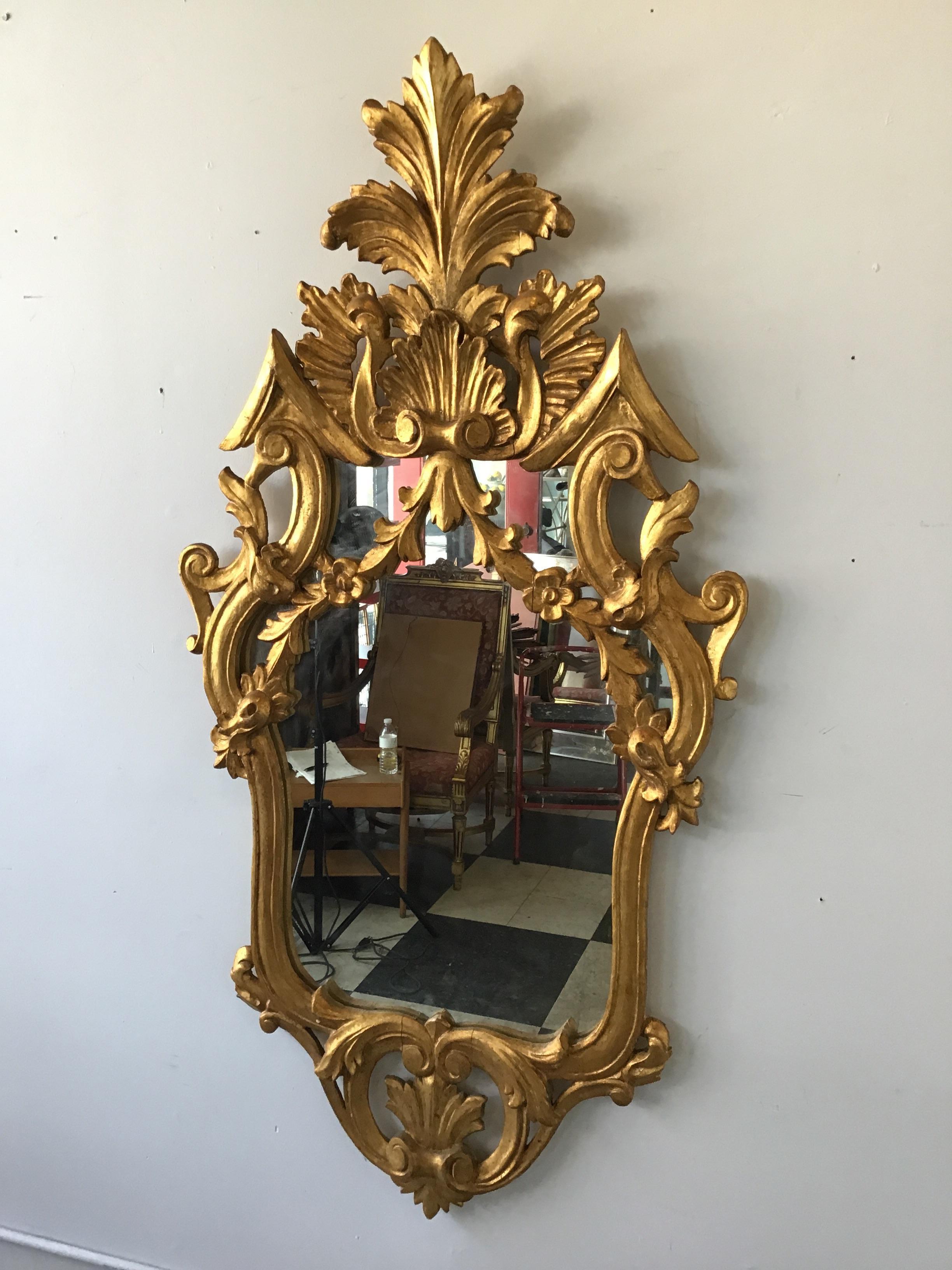 1950s Italian gilt carved wood mirror.