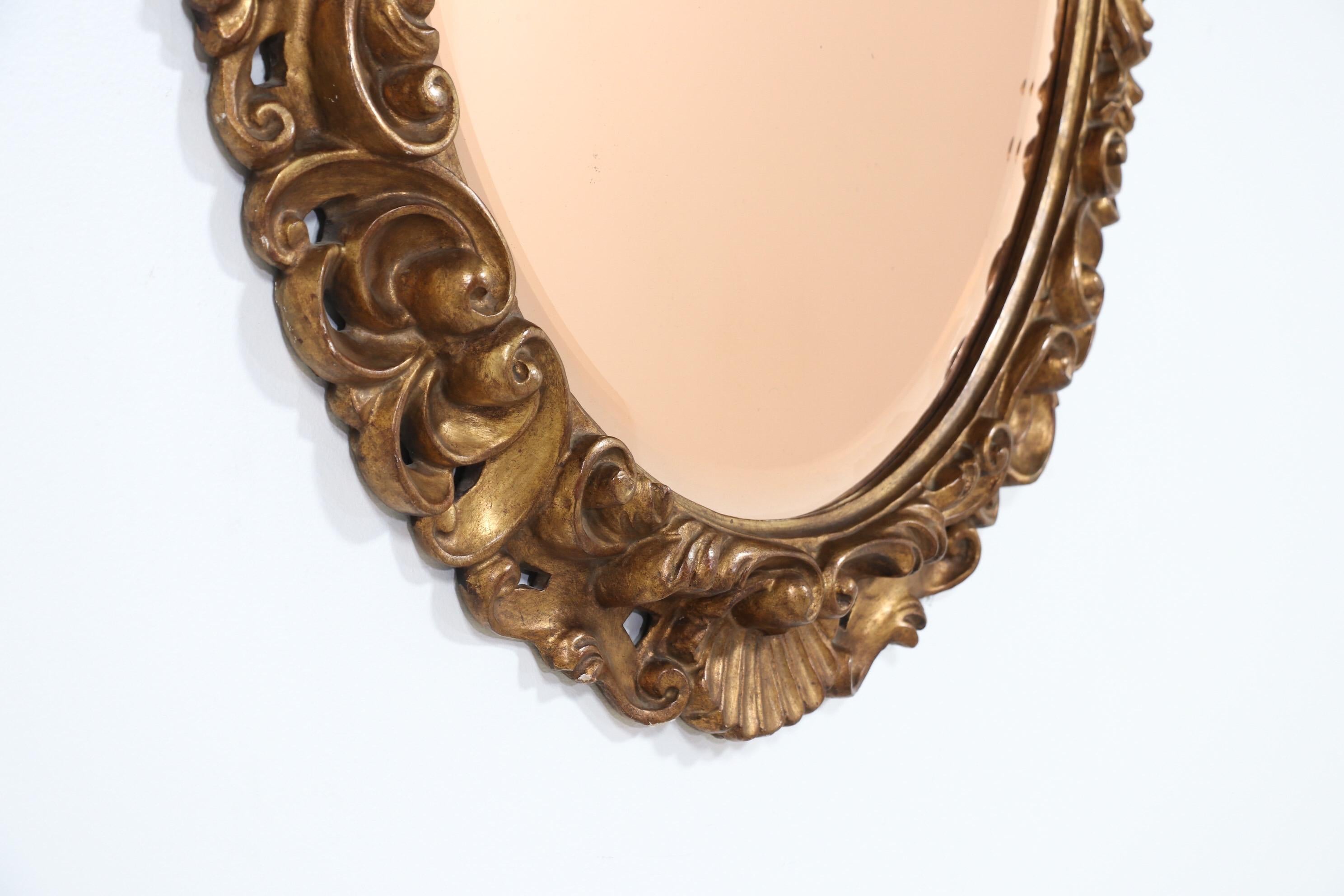 1950s Italian Giltwood And Pink Glass Mirror In Good Condition In Los Angeles, CA