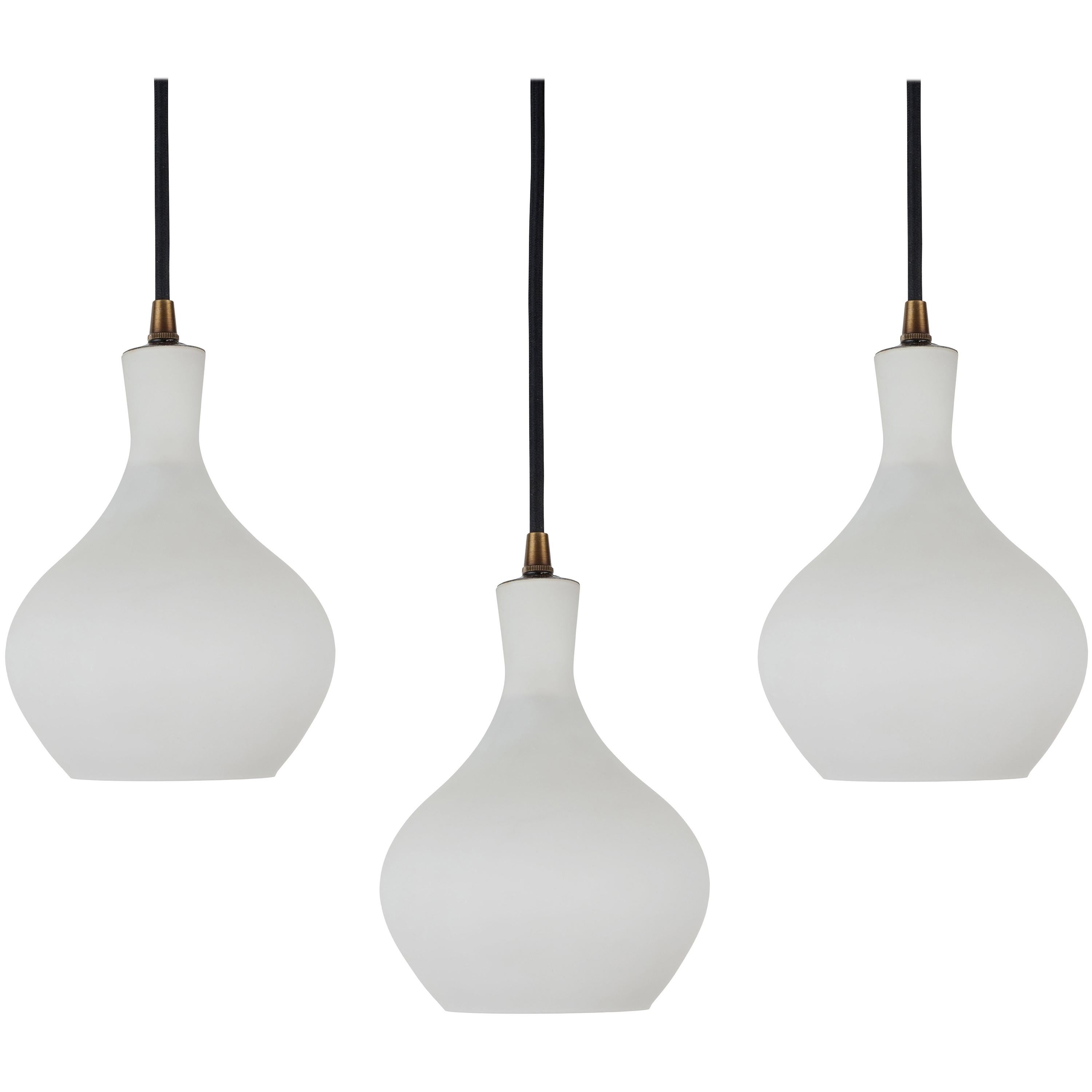 1950s, Italian glass pendants attributed to Stilnovo. Executed in opaline matte glass with patinated brass hardware detail and black painted metal. A sculptural and refined set of pendants characteristic of 1960s Italian design at its most elegant