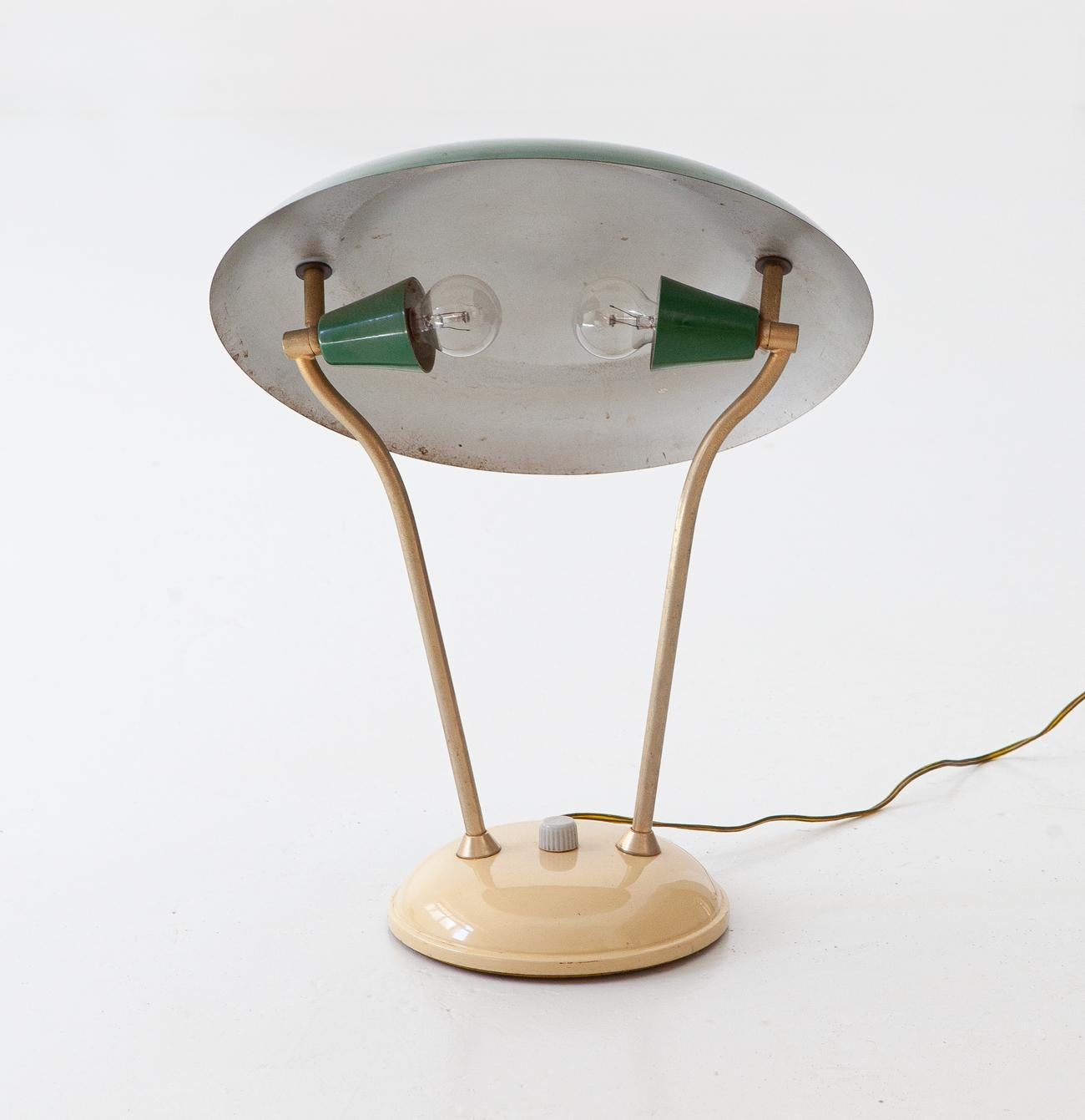 1950s Italian design desk lamp
Bottle green enameled metal tilting lampshade.

2 standard e14 bulbs.



 