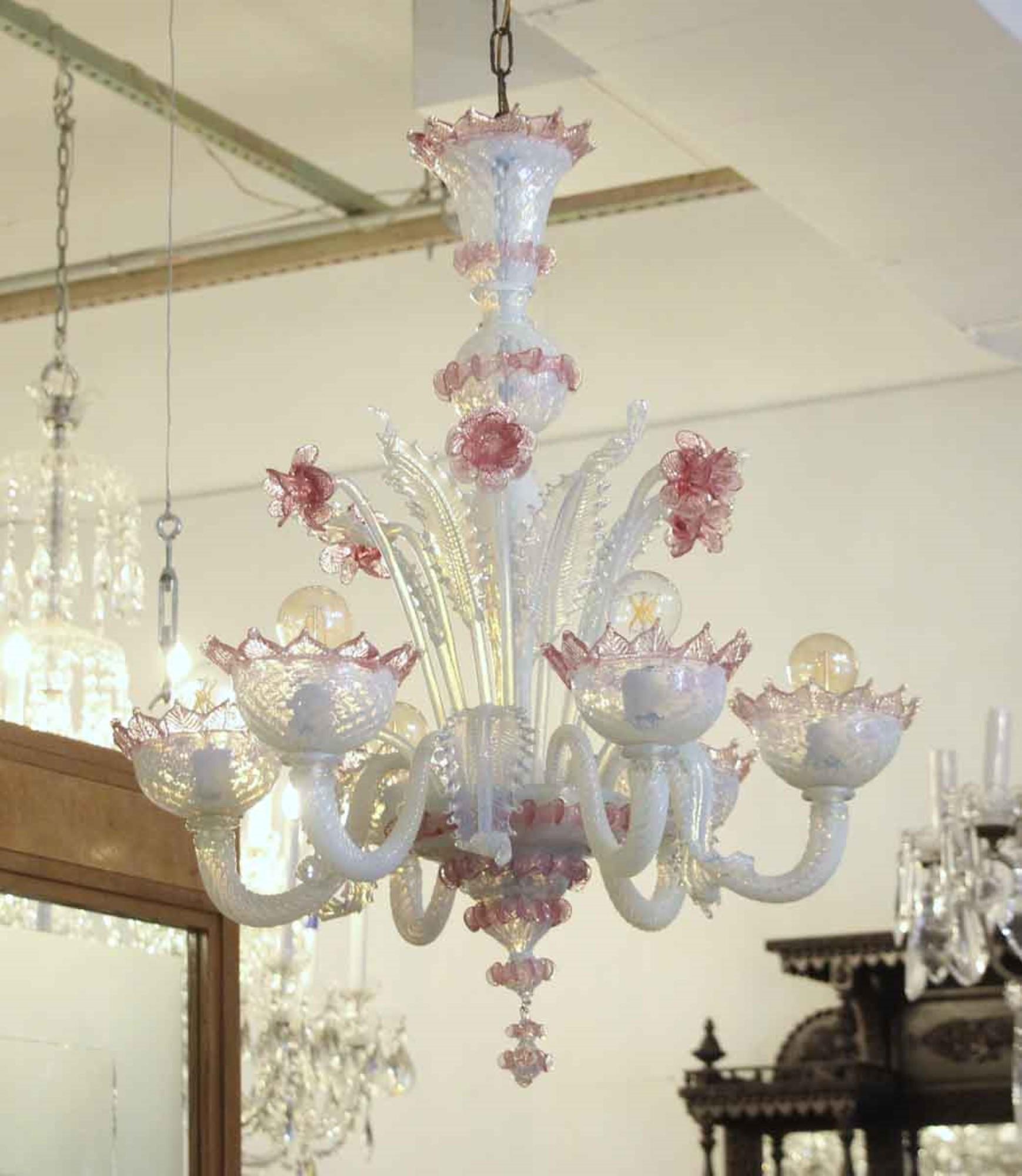 1950s Venetian clear and delightful pink floral Murano glass chandelier with six arms. From Italy. Price includes restoration. This can be seen at our 333 West 52nd St location in the Theater District West of Manhattan.
