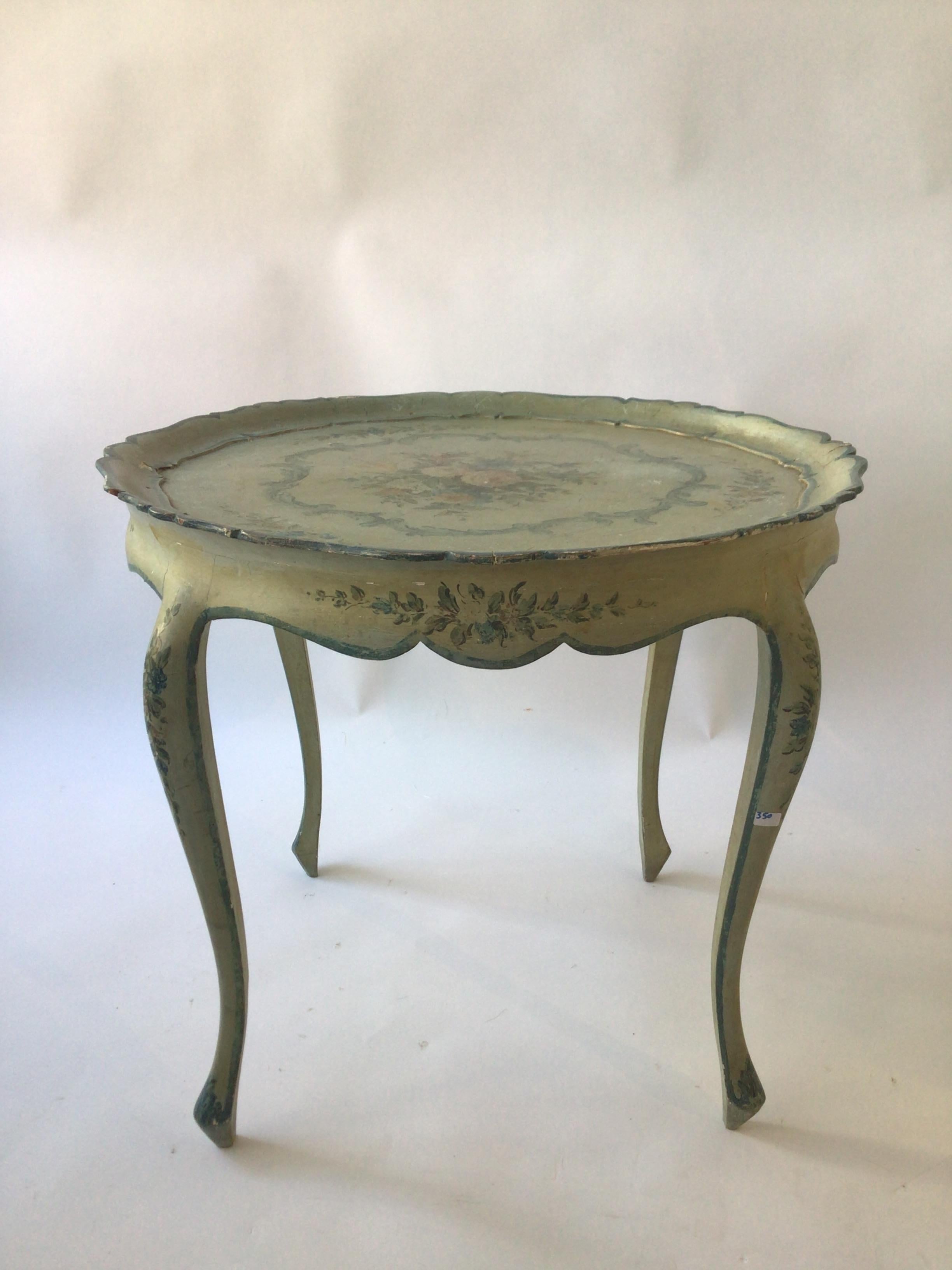 1950s Venetian hand painted floral table. The table is teal. Blueish green..
This table can be shipped via UPS.
