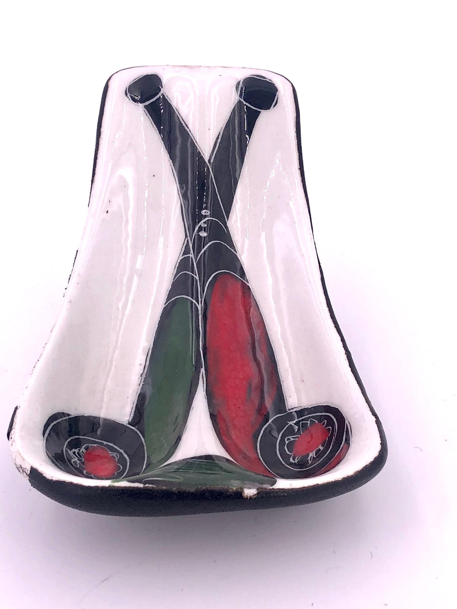 Beautiful Italian hand painted double pipe holder, circa 1950s with leather backing stamped on the bottom made in Italy, please note the leather on the back has come off and its missing some the ceramic is perfect no chips or cracks.
