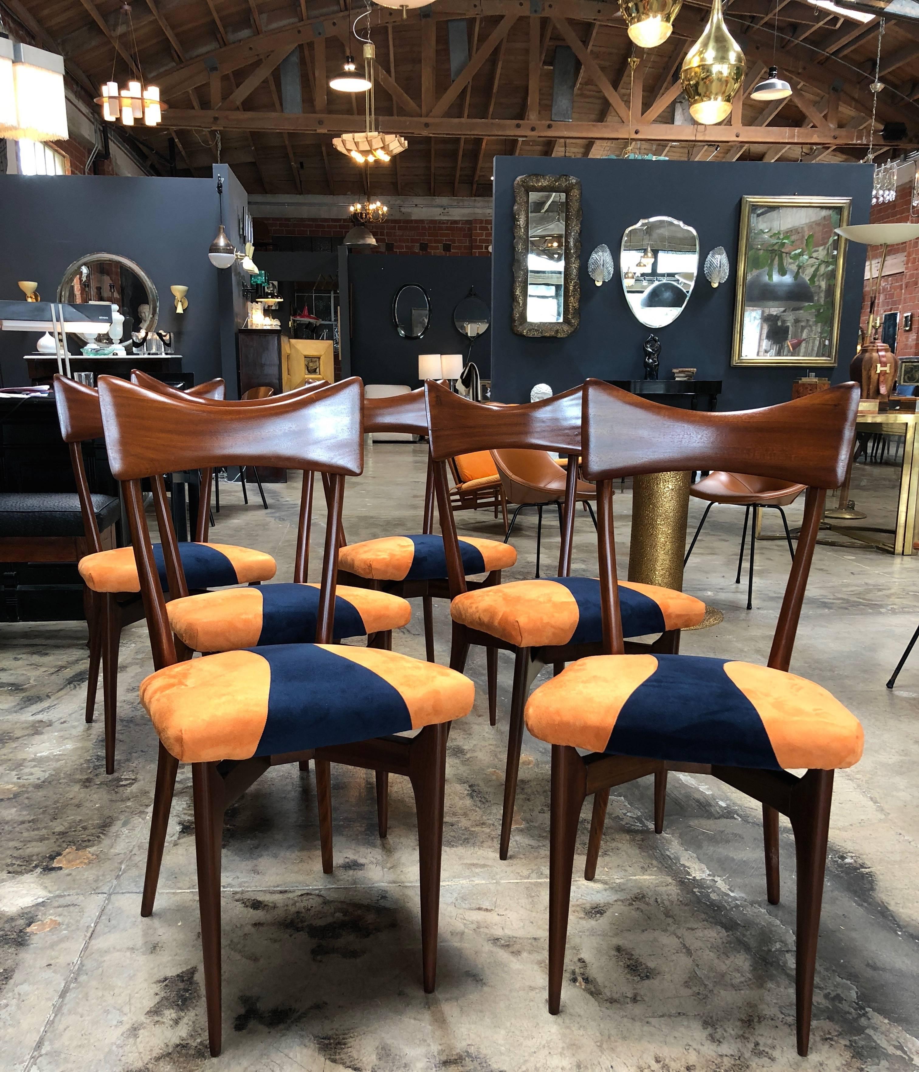 Set of six beech high back dining chairs of the Italian designer Ico Parisi reupholstered in blue and orange fabric.