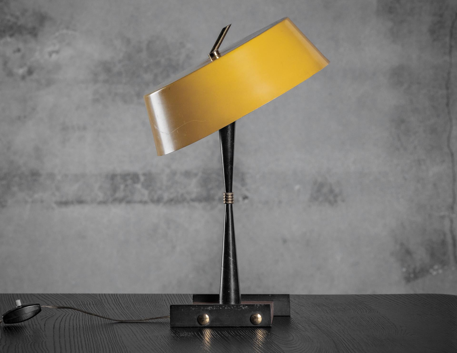 Italy, wood, black and yellow painted metal and brass table lamp, 1950s.