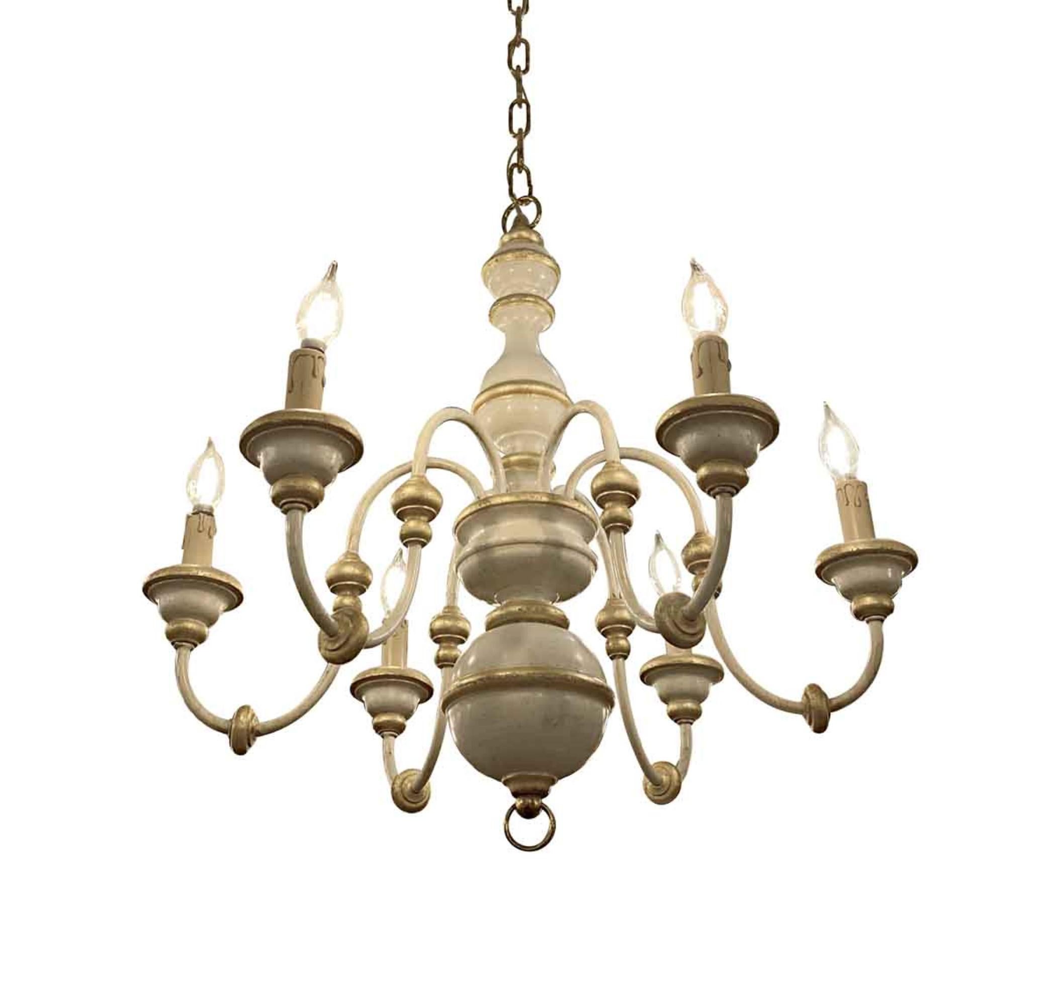 Italian six-arm midcentury solid wooden chandelier from the 1950s painted off white and gold with a brush-like texture. This light is wired and ready to ship. This can be seen at our 333 West 52nd St location in the Theater District West of