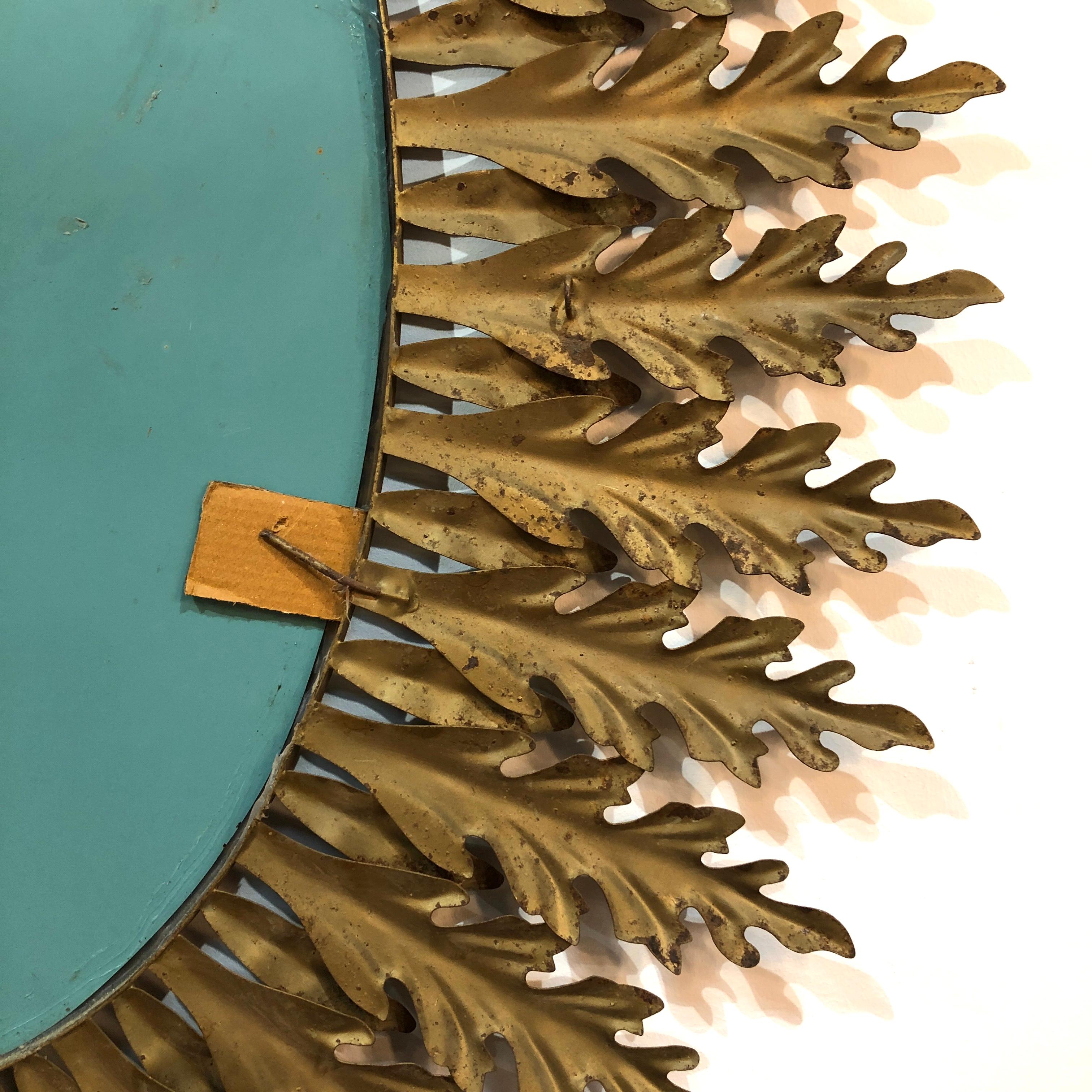 1950’s Italian large oval mirror features layers of Acanthus leaves cut from pressed aluminium into a starburst pattern. Very nice patina. An absolute thing of beauty.

Sourced in Paris

H 98cm, W 78cm
Mirror plate H 57cm, W 35cm

Please contact us