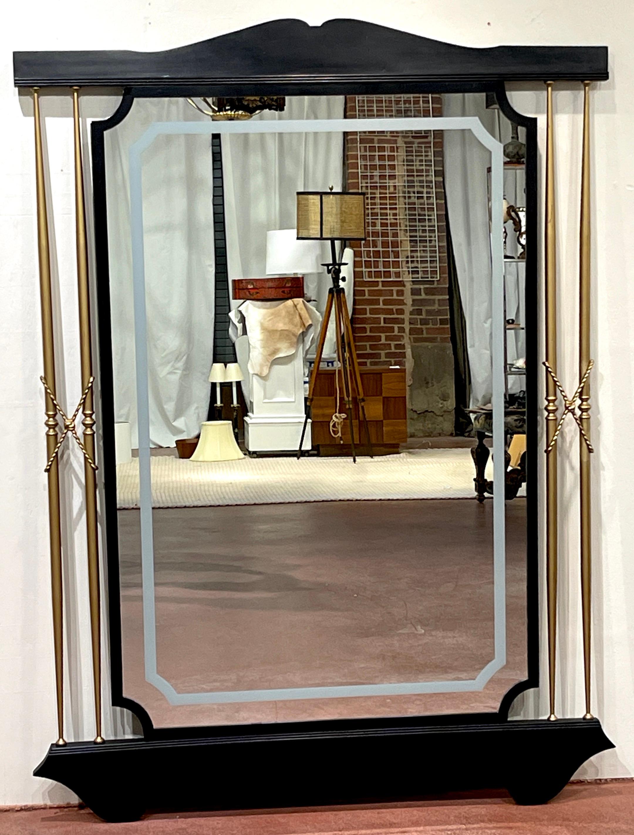 1950s Italian Modern floor/ wall mmirror
Design influences of Fontana Arte & Gio Ponti 

A substantial mirror, with ebonized wood frame holding the clear and engraved/frosted mirror, with inverted canted corners, flanked by twin gilt 'X' rope