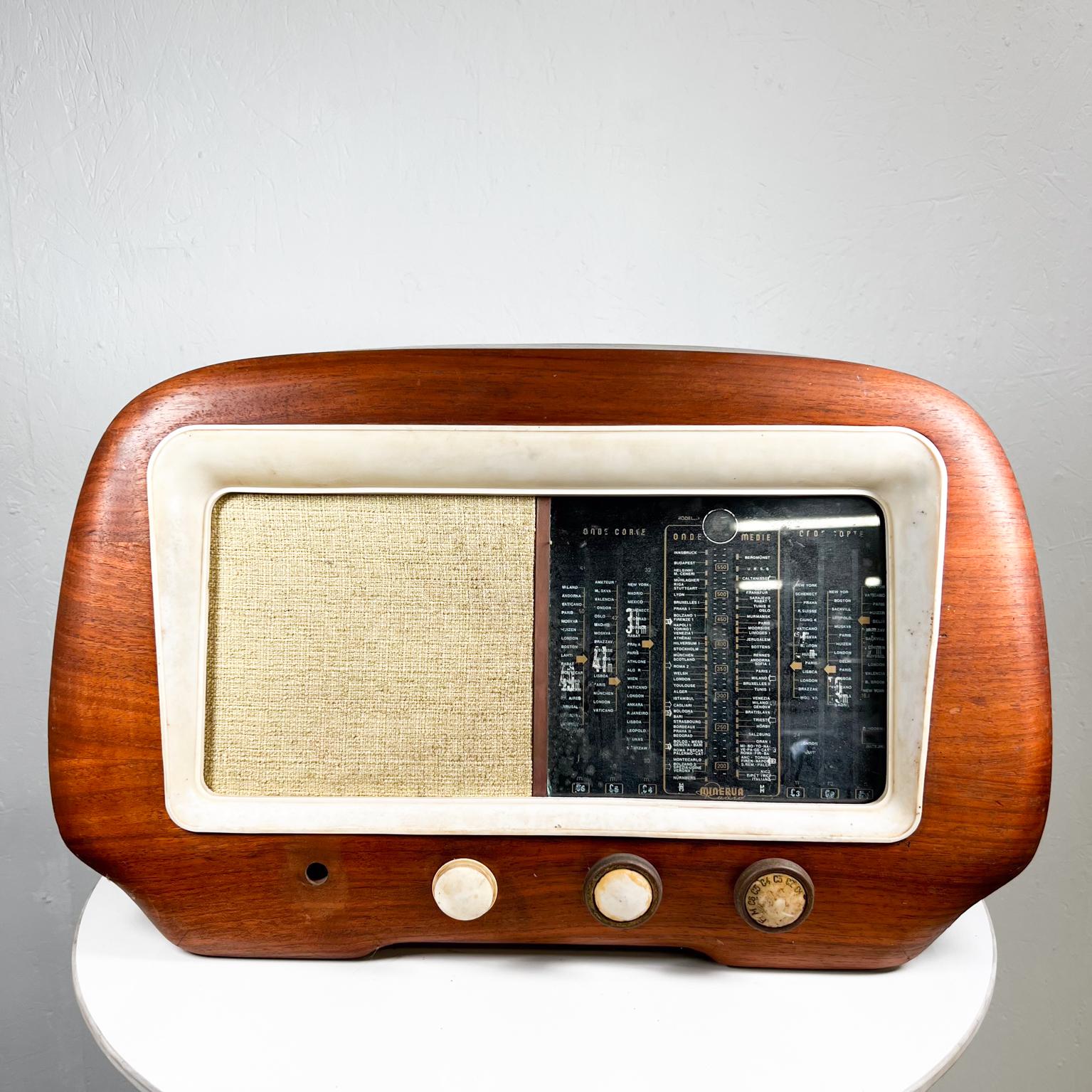 1950s Italian Modern Minerva Milano Short Wave Wood Radio
8.5 d x 22.63 w x 10. H
Preowned untested unrestored vintage condition. 
Missing parts. See all images.
Decorative display use only.
