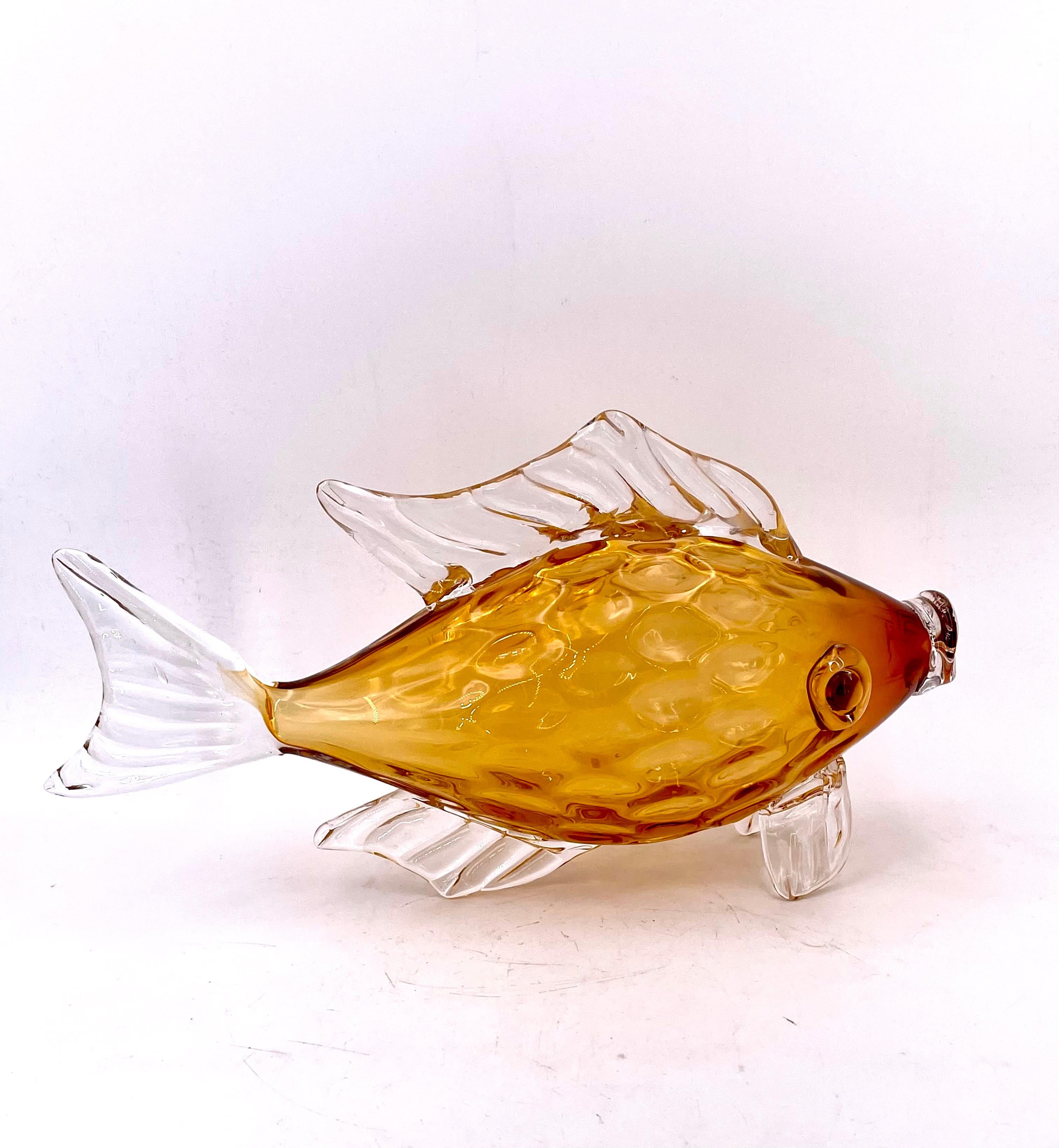 Gorgeous decorative Italian Murano GlassFish, circa 1950's with amber body and clear fins, great condition nice size and weight, remanence of the Iconic Blenko glass Fish.