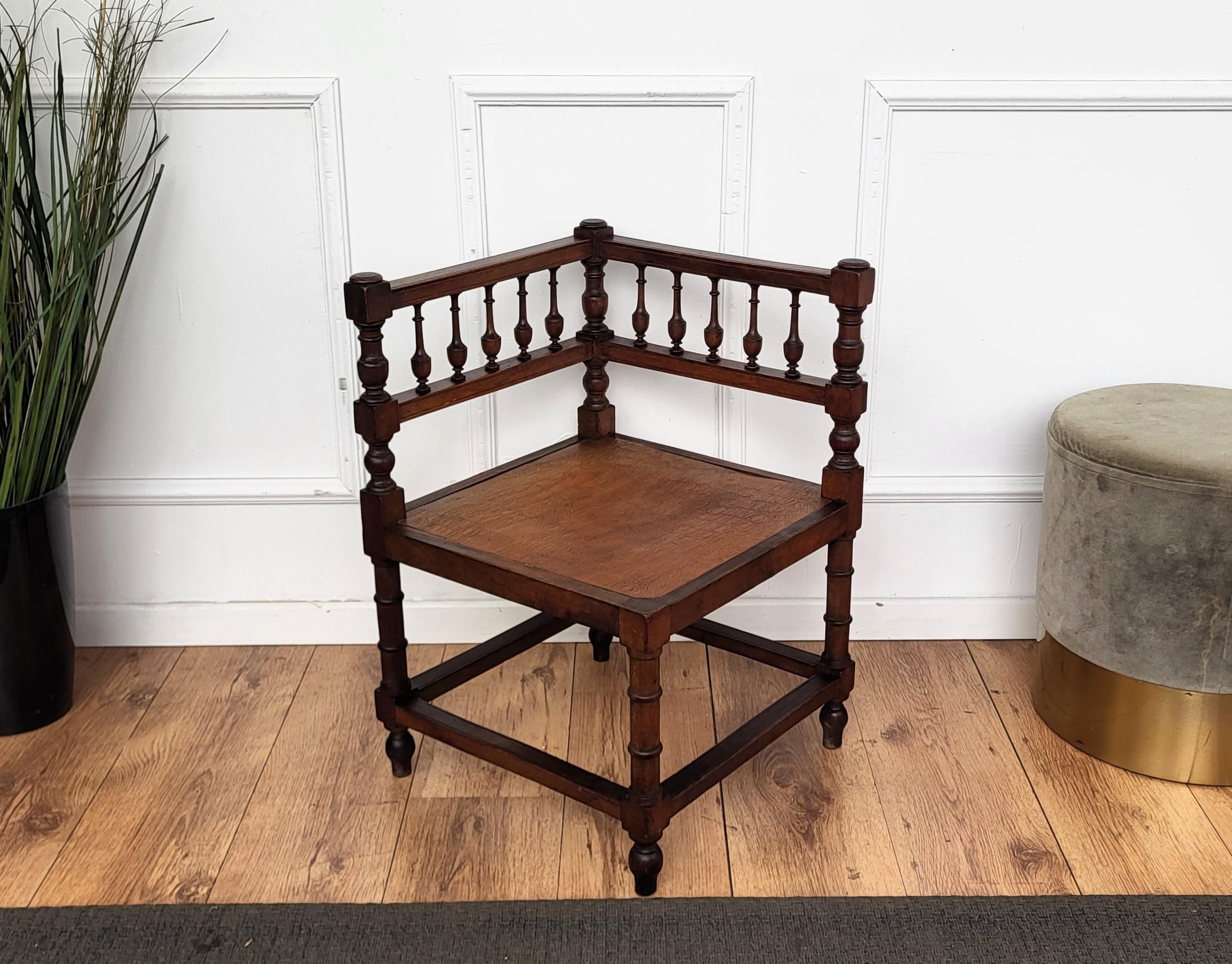 A very charming and besutifully carved and crafted wood corner chair with its aligator shaped seat. 