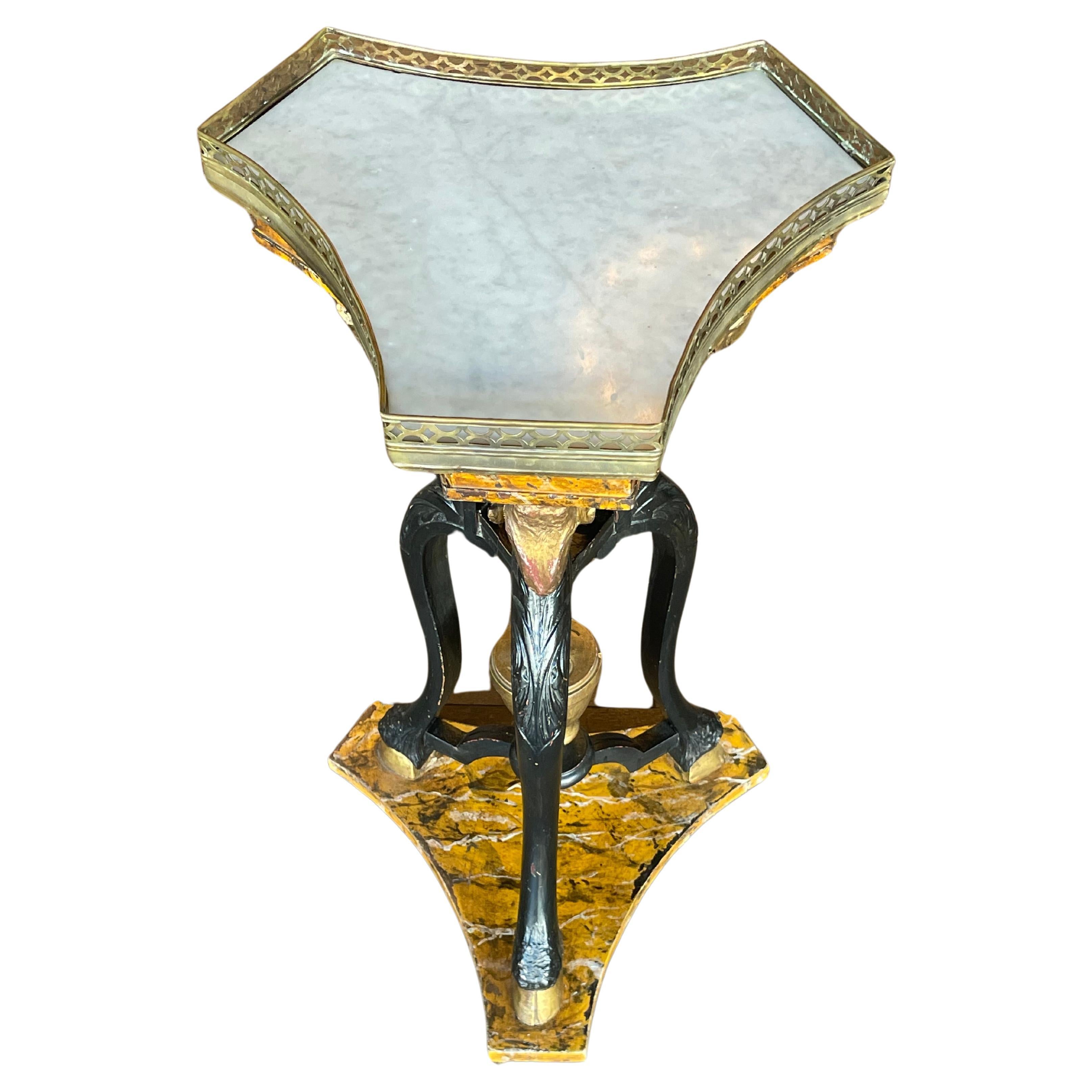 Italian Neoclassical Brass mounted parcel occasional table circa 1950
Gilt ebonite base 
Tripartite faux marble top 


